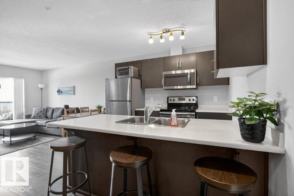 #315 142 Ebbers Bv Nw, Edmonton, AB - Indoor Photo Showing Kitchen With Double Sink With Upgraded Kitchen