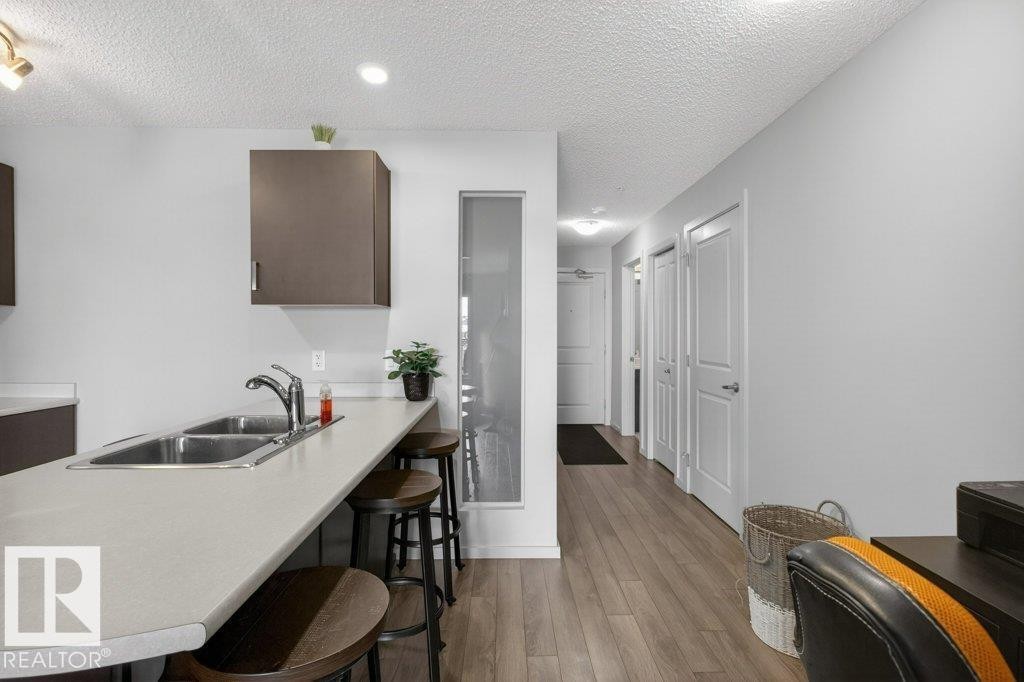 #315 142 Ebbers Bv Nw, Edmonton, AB - Indoor Photo Showing Kitchen With Double Sink
