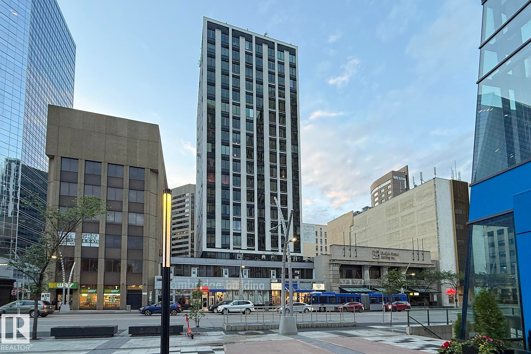 Modern high-rise with a sleek facade and multiple windows - #412 10024 Jasper Av Nw, Edmonton, AB - Outdoor