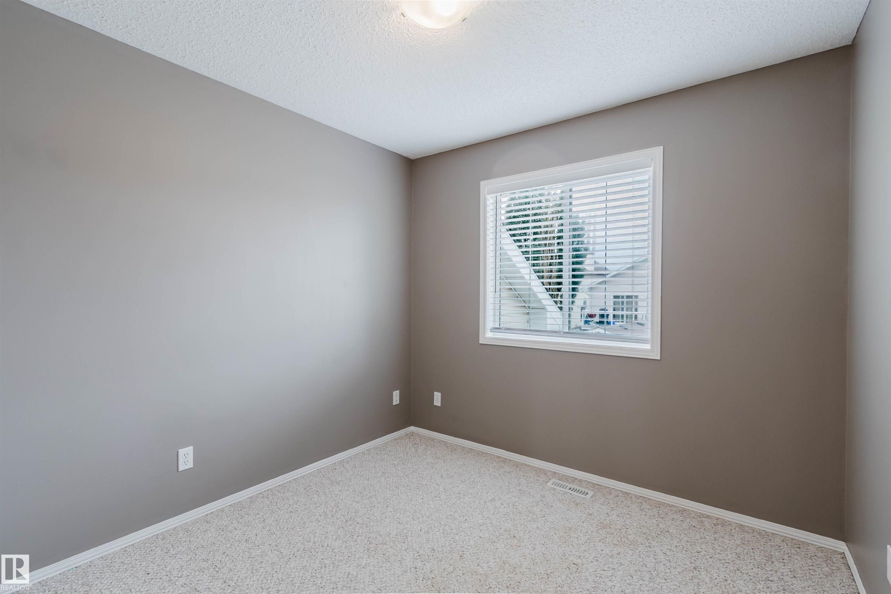 Neutral-toned room with light-colored carpeting - 38 1780 Glastonbury Boulevard, Edmonton, AB