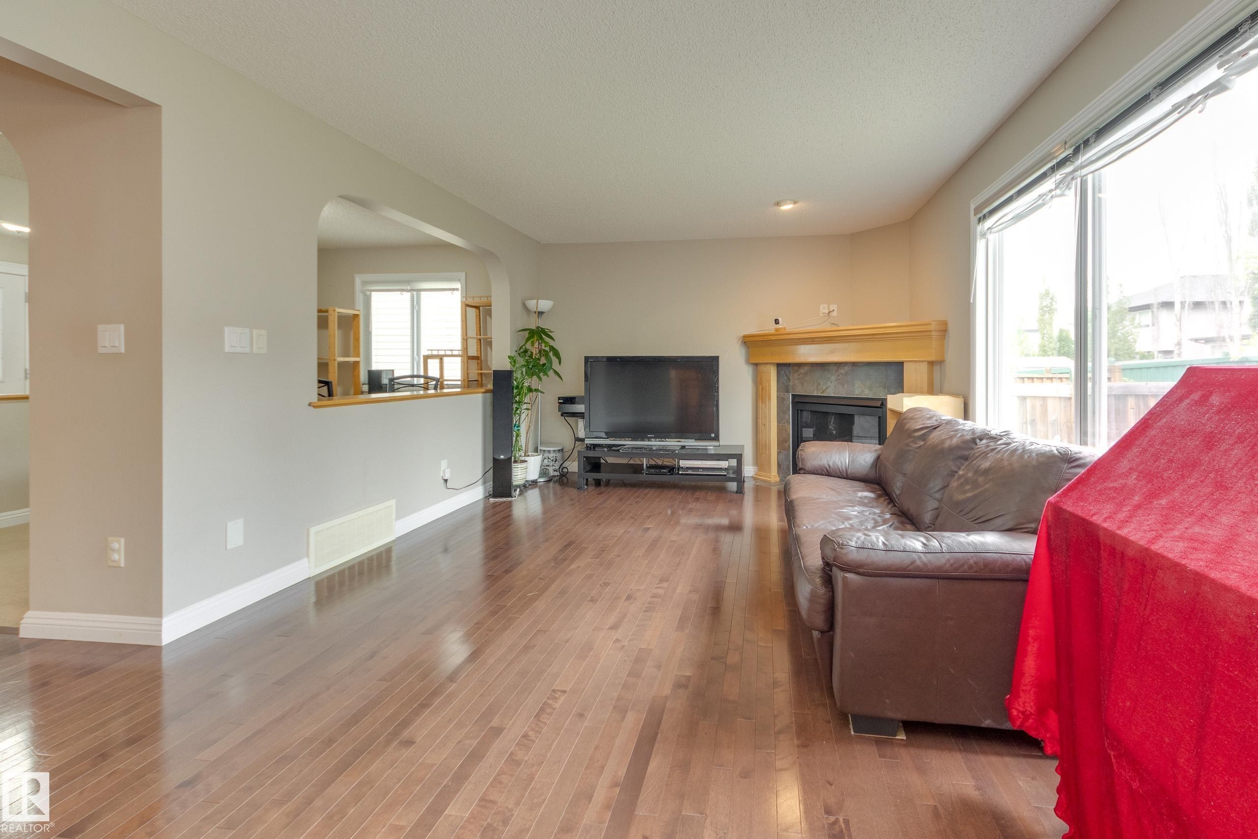2426 Hagen Way, Edmonton, AB - Indoor Photo Showing Living Room With Fireplace