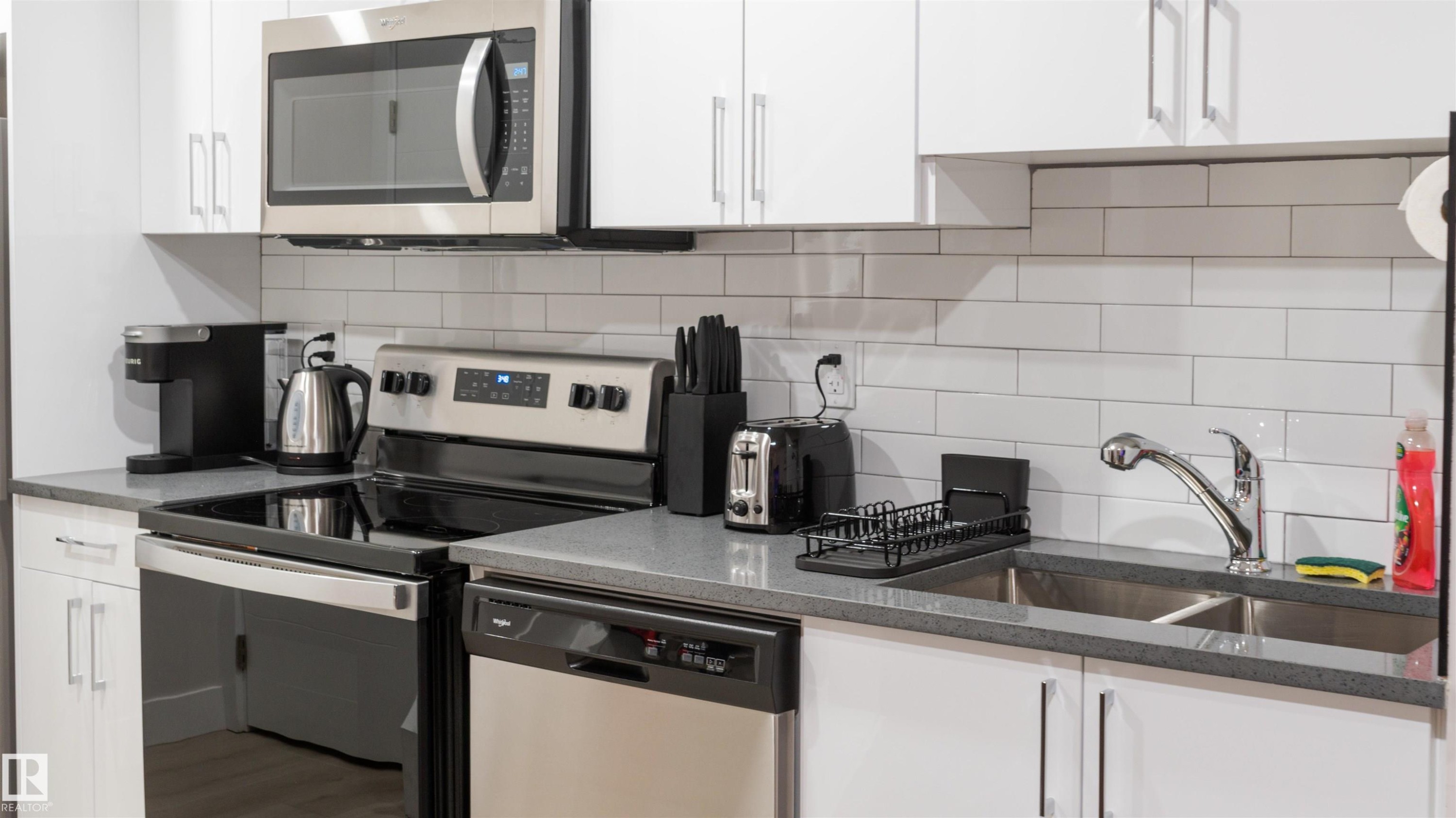 2104 160 Street Sw, Edmonton, AB - Indoor Photo Showing Kitchen With Double Sink