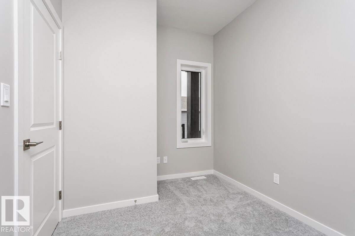 2480 Egret Loop Nw, Edmonton, AB - Indoor Photo Showing Other Room