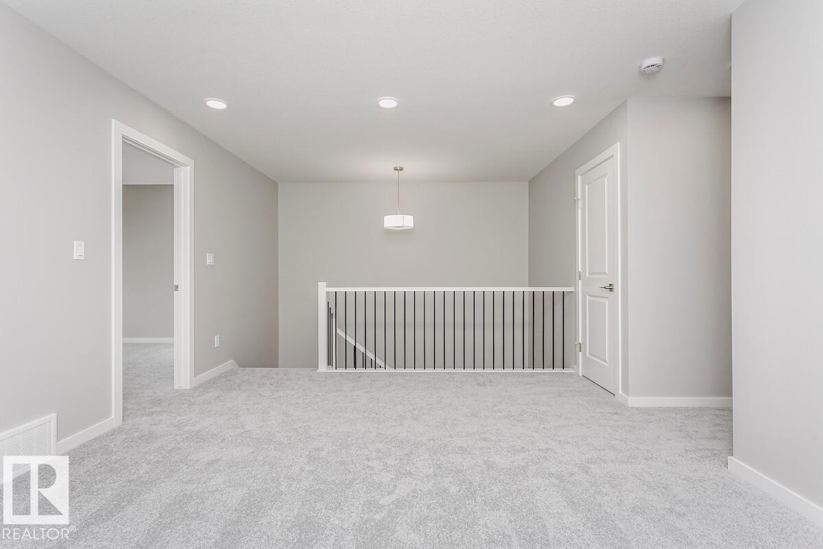 2480 Egret Loop Nw, Edmonton, AB - Indoor Photo Showing Other Room