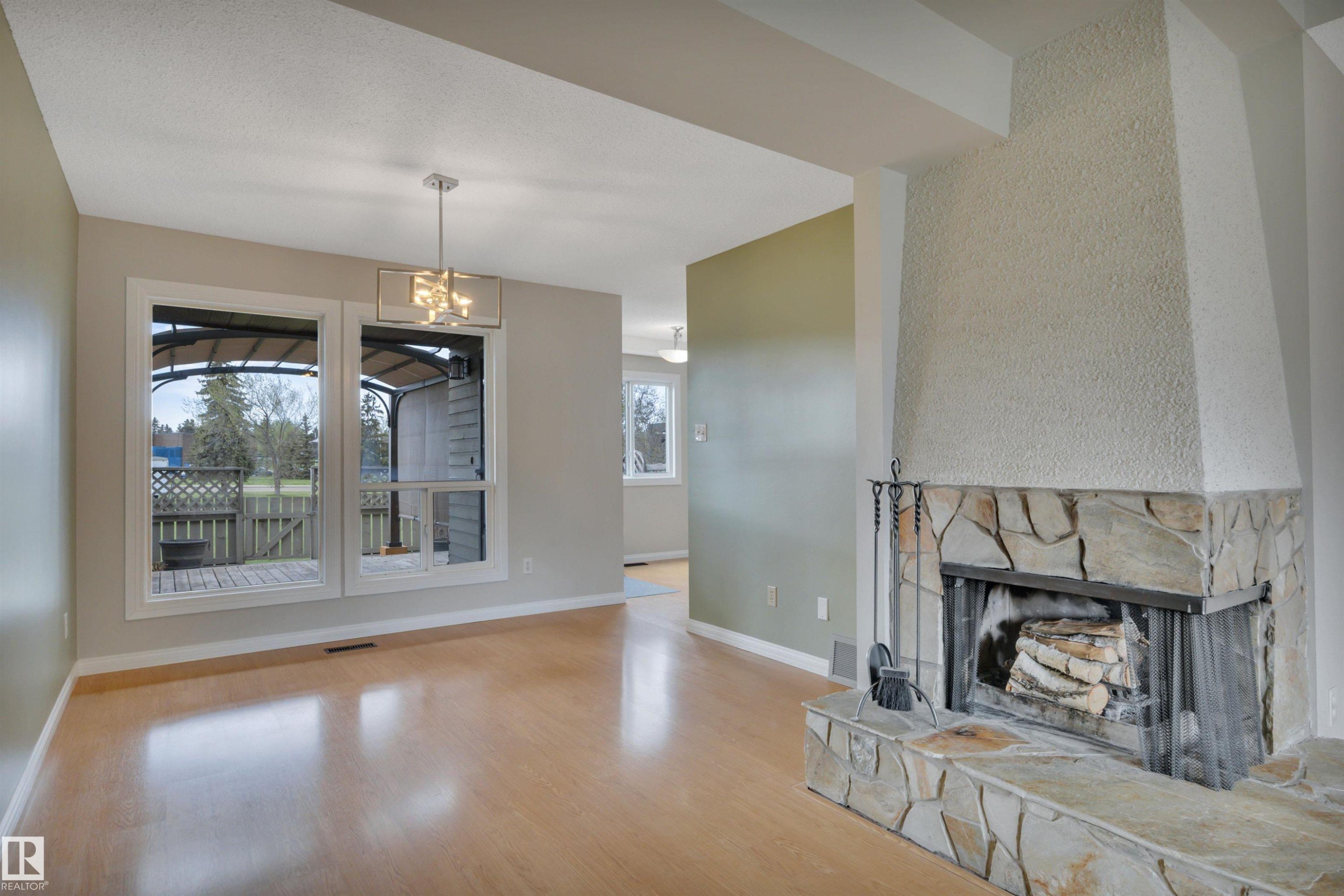 5353 Hill View Crescent Nw, Edmonton, AB - Indoor Photo Showing Living Room With Fireplace