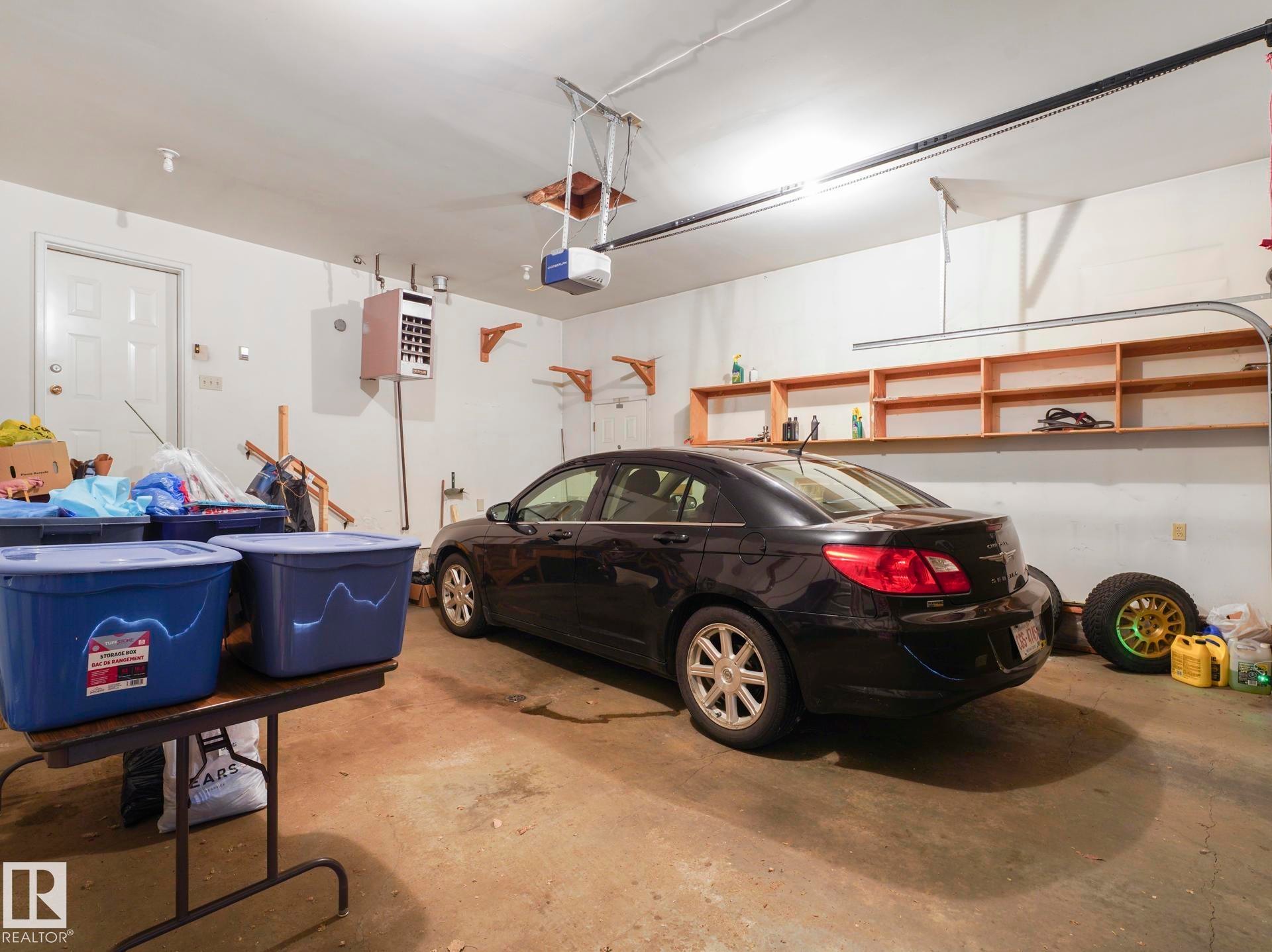 An interior view of the oversized double attached garage. - 9608 150 Street Nw, Edmonton, AB