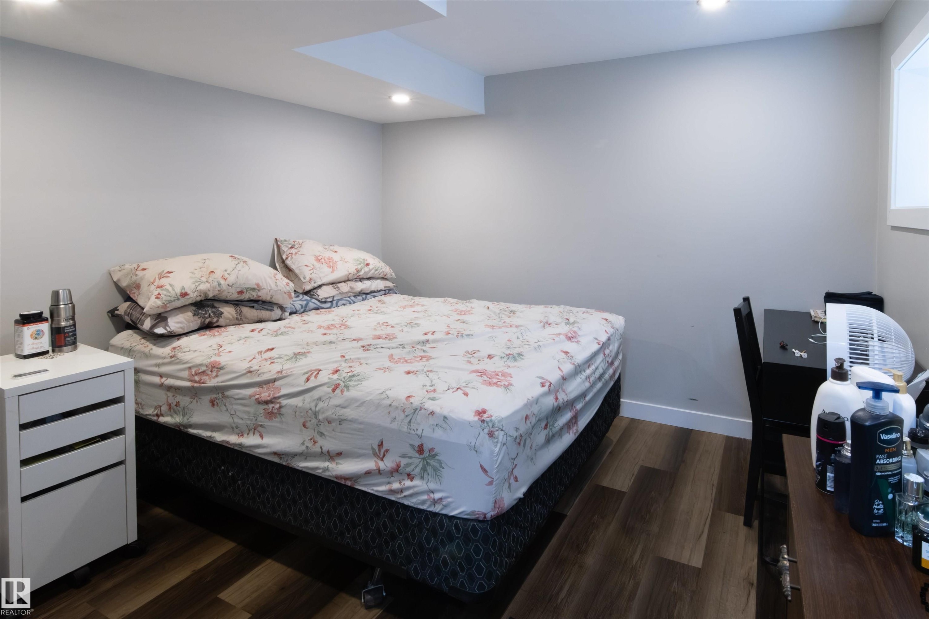 Interior room featuring wood-finish flooring, recessed lighting, and light gray wall paint - 4004 88 Street Nw, Edmonton, AB - Indoor Photo Showing Bedroom