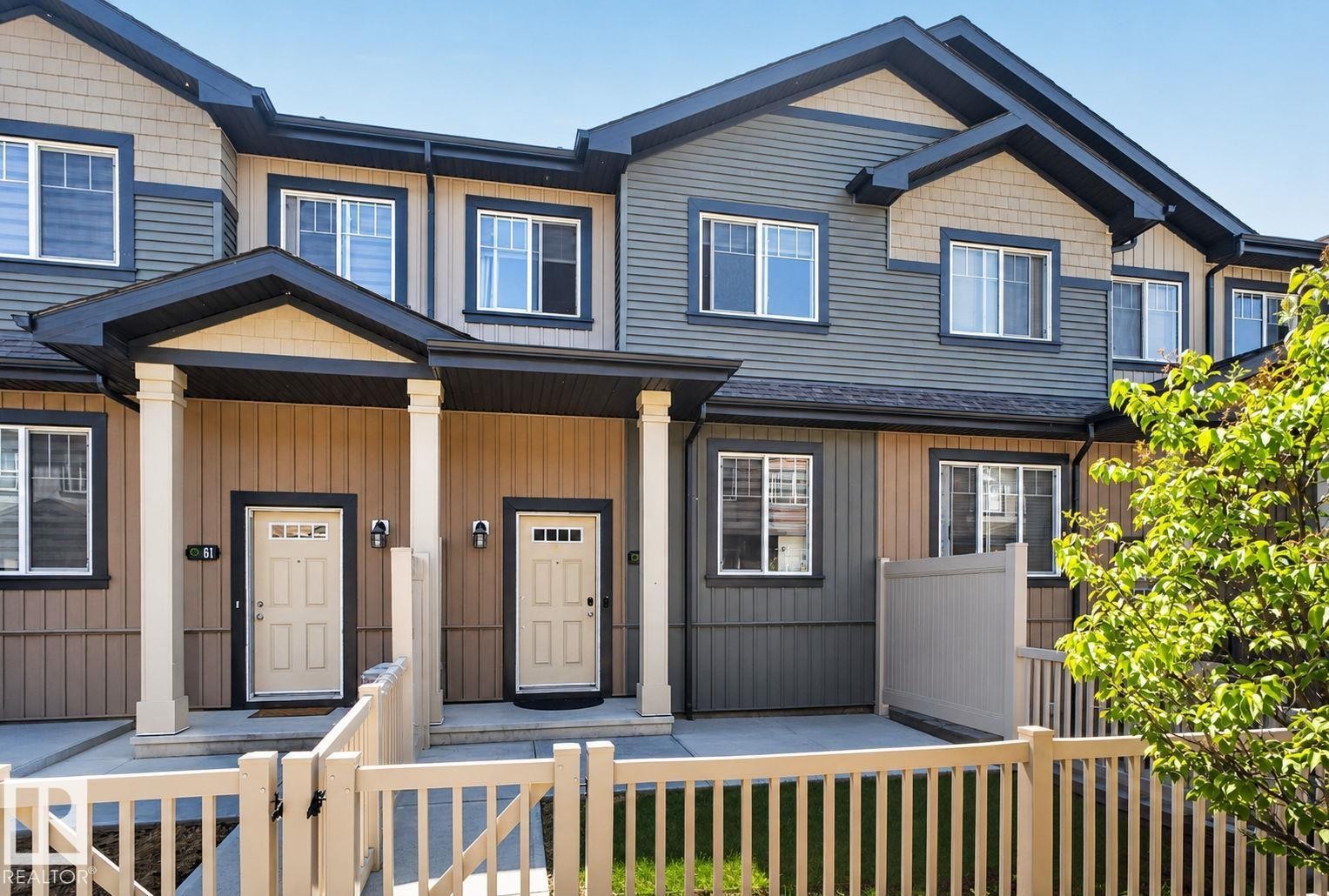 Multi-toned exterior featuring horizontal siding and shingle accents - 62 3305 Orchards Link, Edmonton, AB