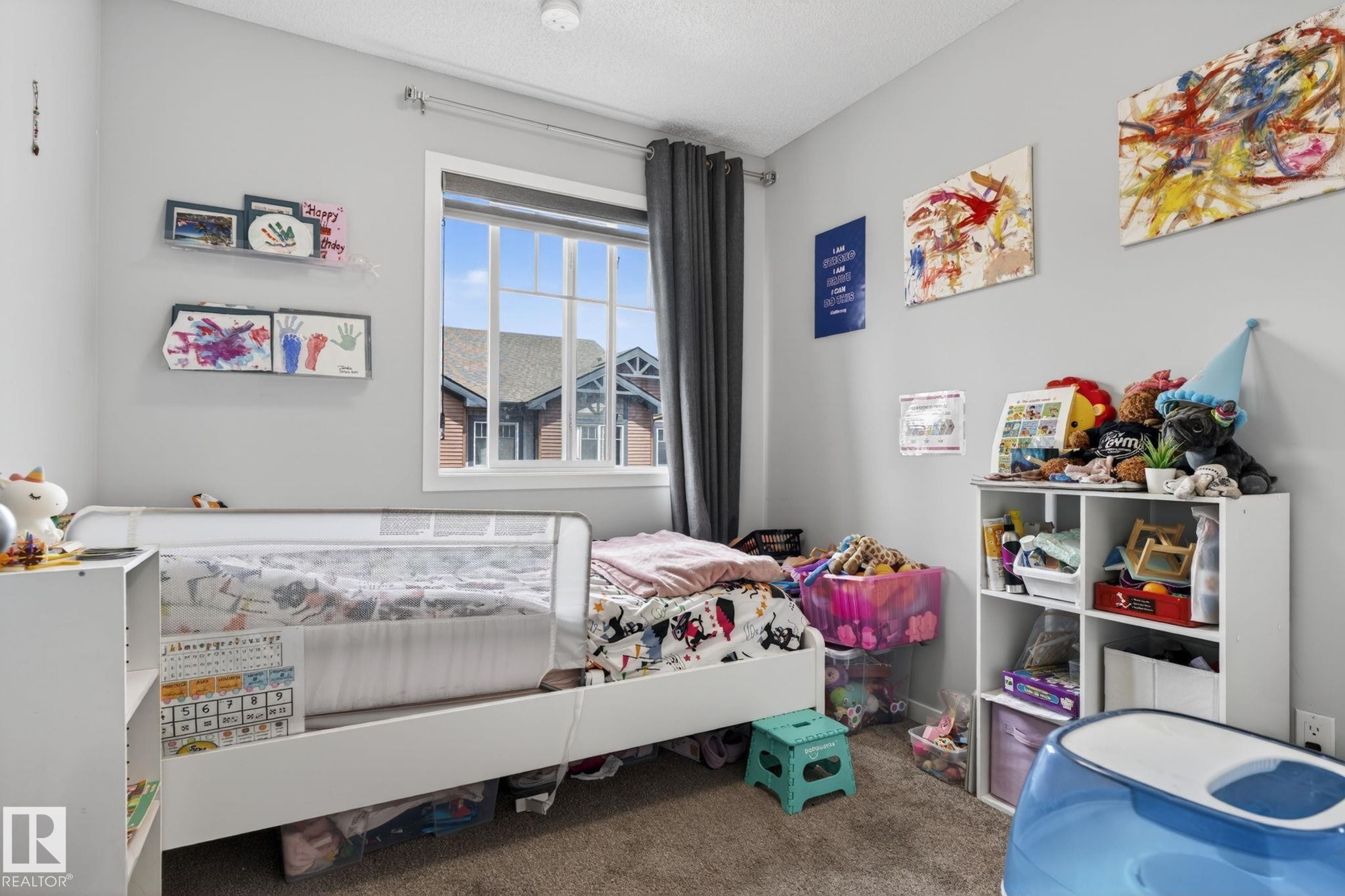 Light gray wall paint and textured carpeting - 62 3305 Orchards Link, Edmonton, AB