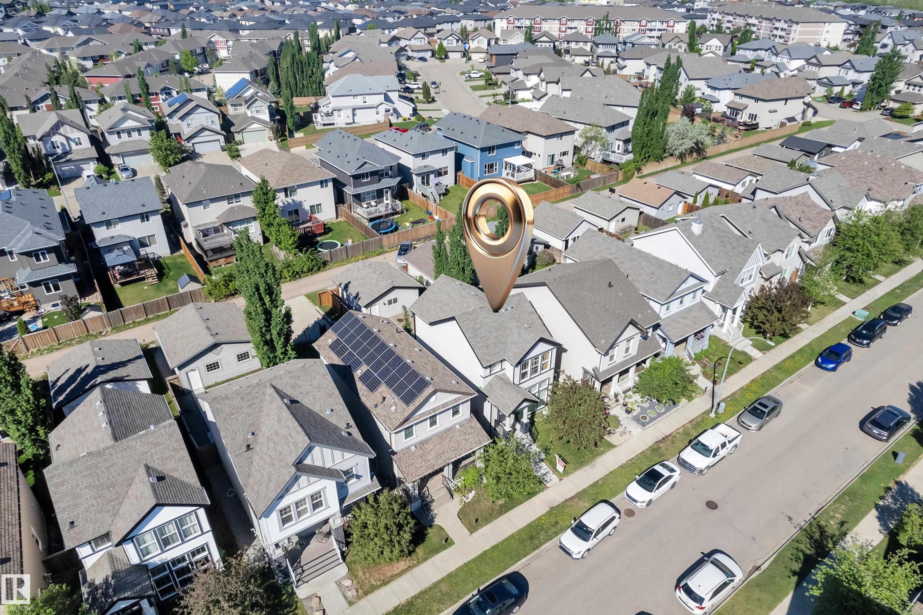 Residential neighborhood with a grid street pattern and uniform lot sizes - 621 Mcdonough Link Link, Edmonton, AB