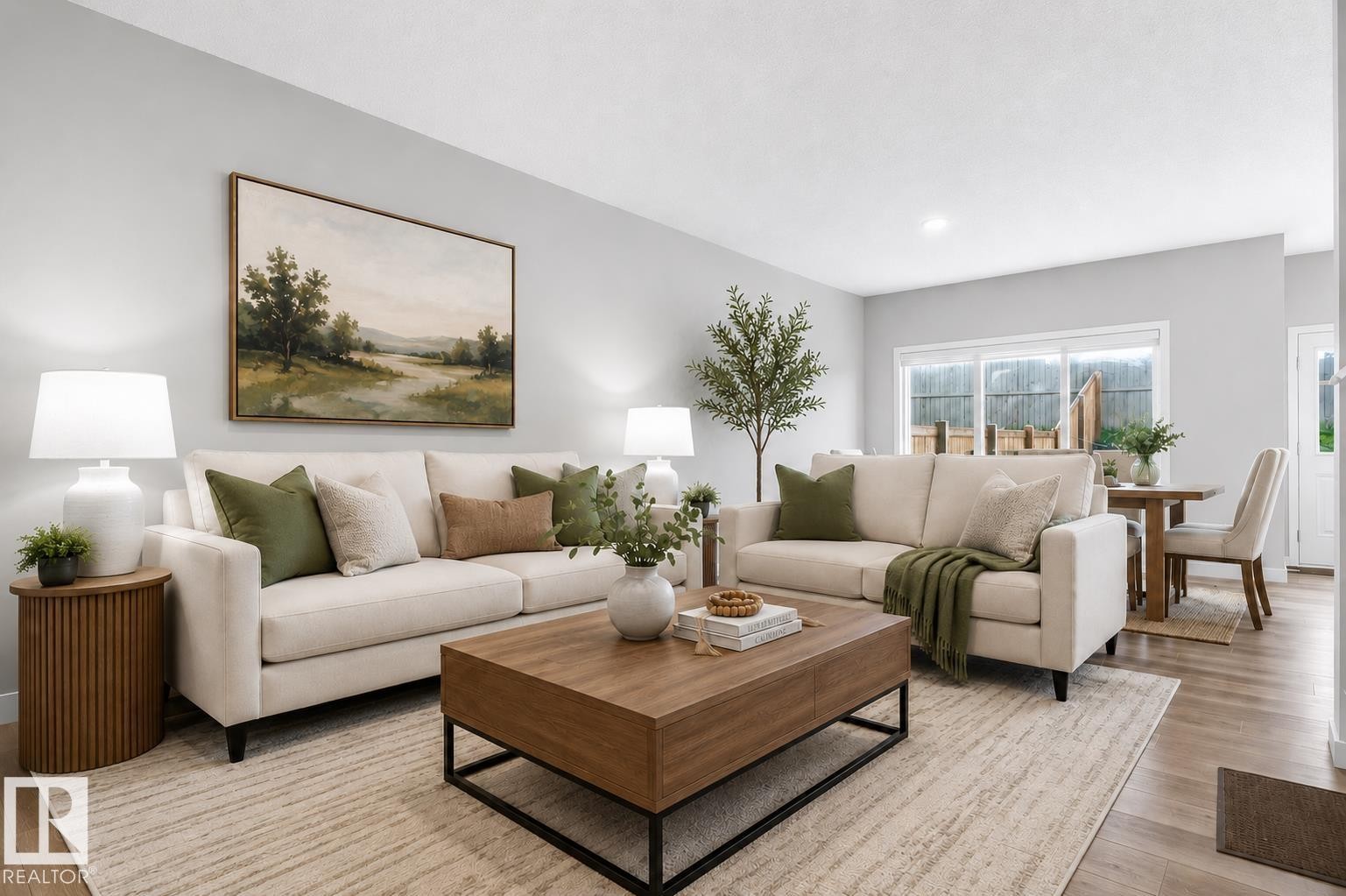 Open-concept living space featuring wood-finish flooring, recessed lighting, and expansive sliding glass doors - 22638 99A Avenue, Edmonton, AB