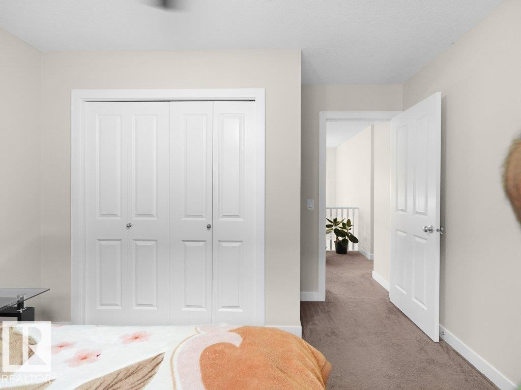 Neutral wall paint with textured ceiling - 3756 8 Street, Edmonton, AB