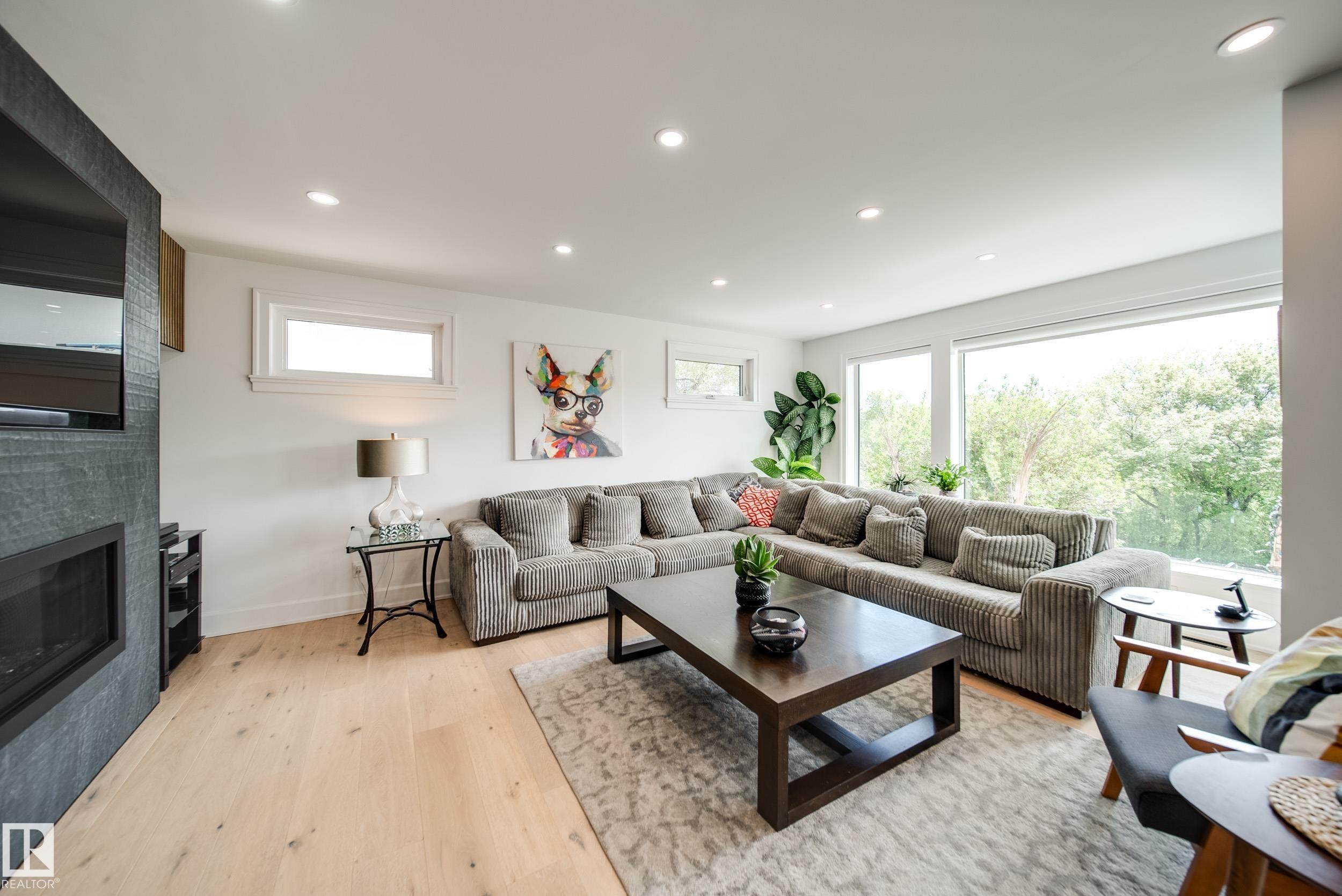 5310 Ada Boulevard Nw, Edmonton, AB - Indoor Photo Showing Living Room With Fireplace