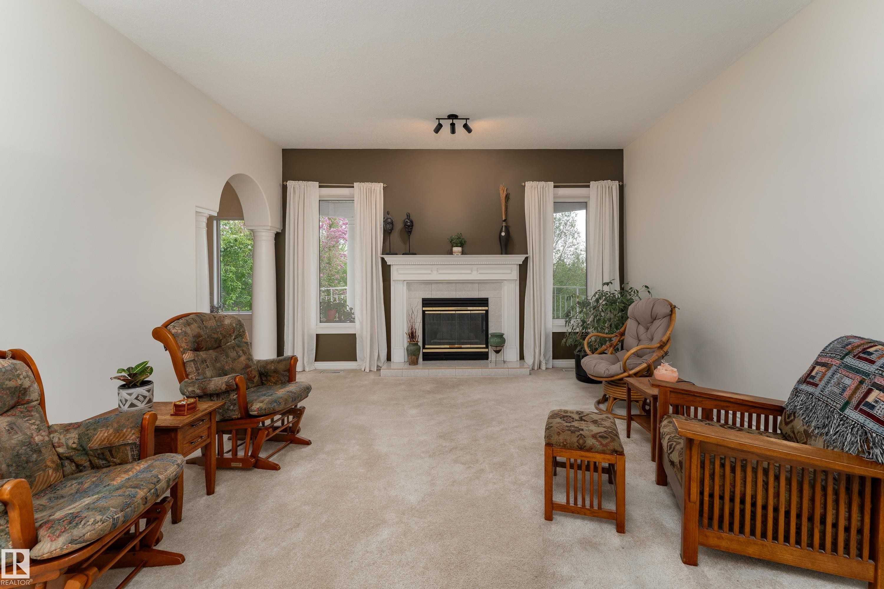 520 Pardee Bay Nw, Edmonton, AB - Indoor Photo Showing Living Room With Fireplace