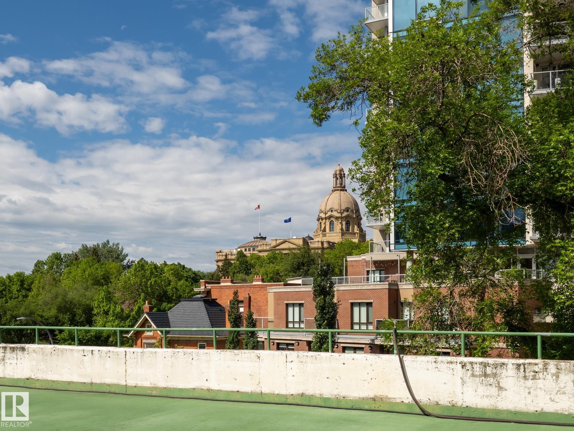 Rooftop patio offering city skyline and architectural landmark - #Ph4 9725 106 St Nw, Edmonton, AB - Outdoor