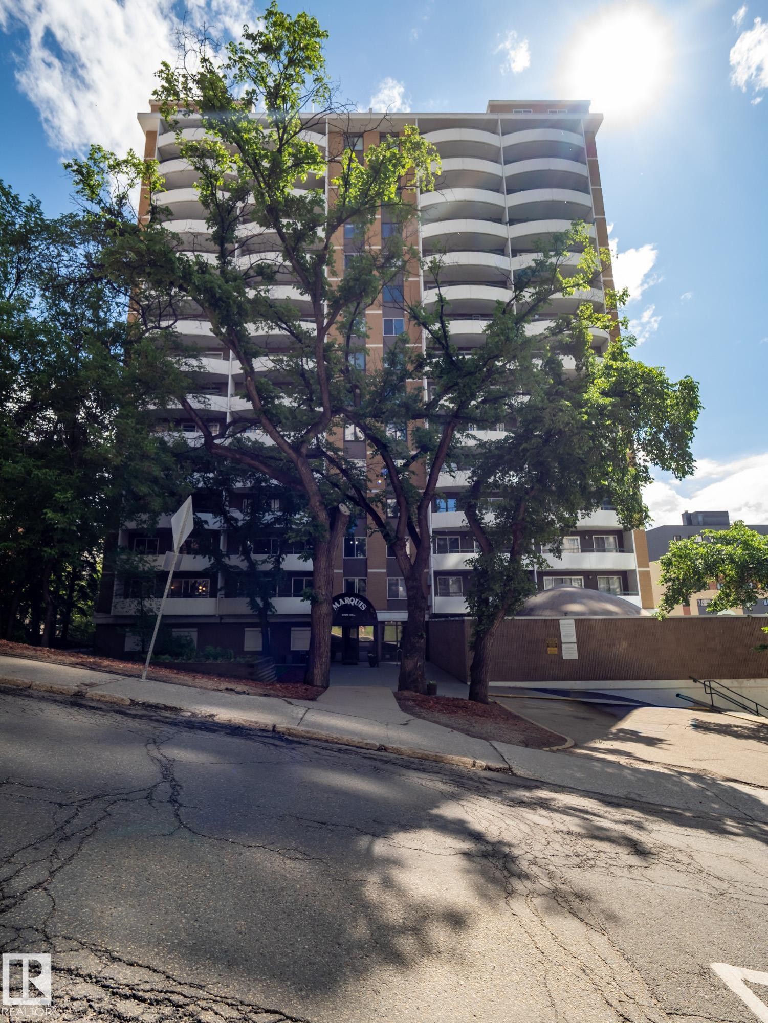 Mid-rise building featuring multiple levels of curved balconies - #Ph4 9725 106 St Nw, Edmonton, AB - Outdoor