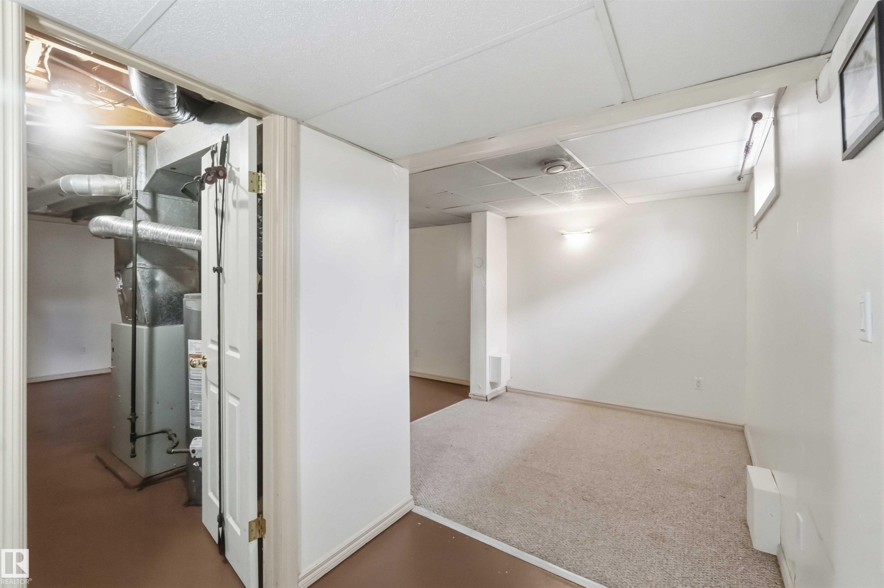 Utility area with exposed ductwork and mechanical systems - 17325 85 Avenue Nw, Edmonton, AB