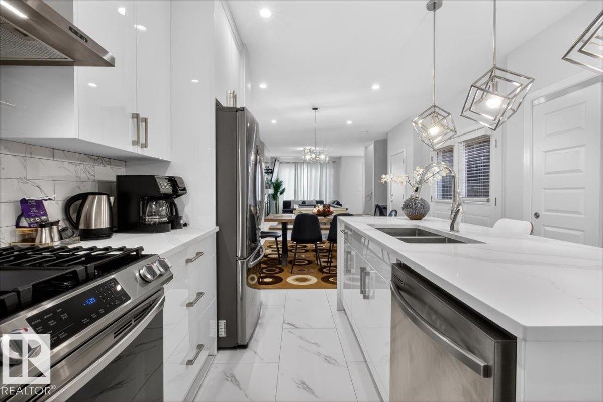 8090 Kiriak Link Sw, Edmonton, AB - Indoor Photo Showing Kitchen With Stainless Steel Kitchen With Double Sink With Upgraded Kitchen
