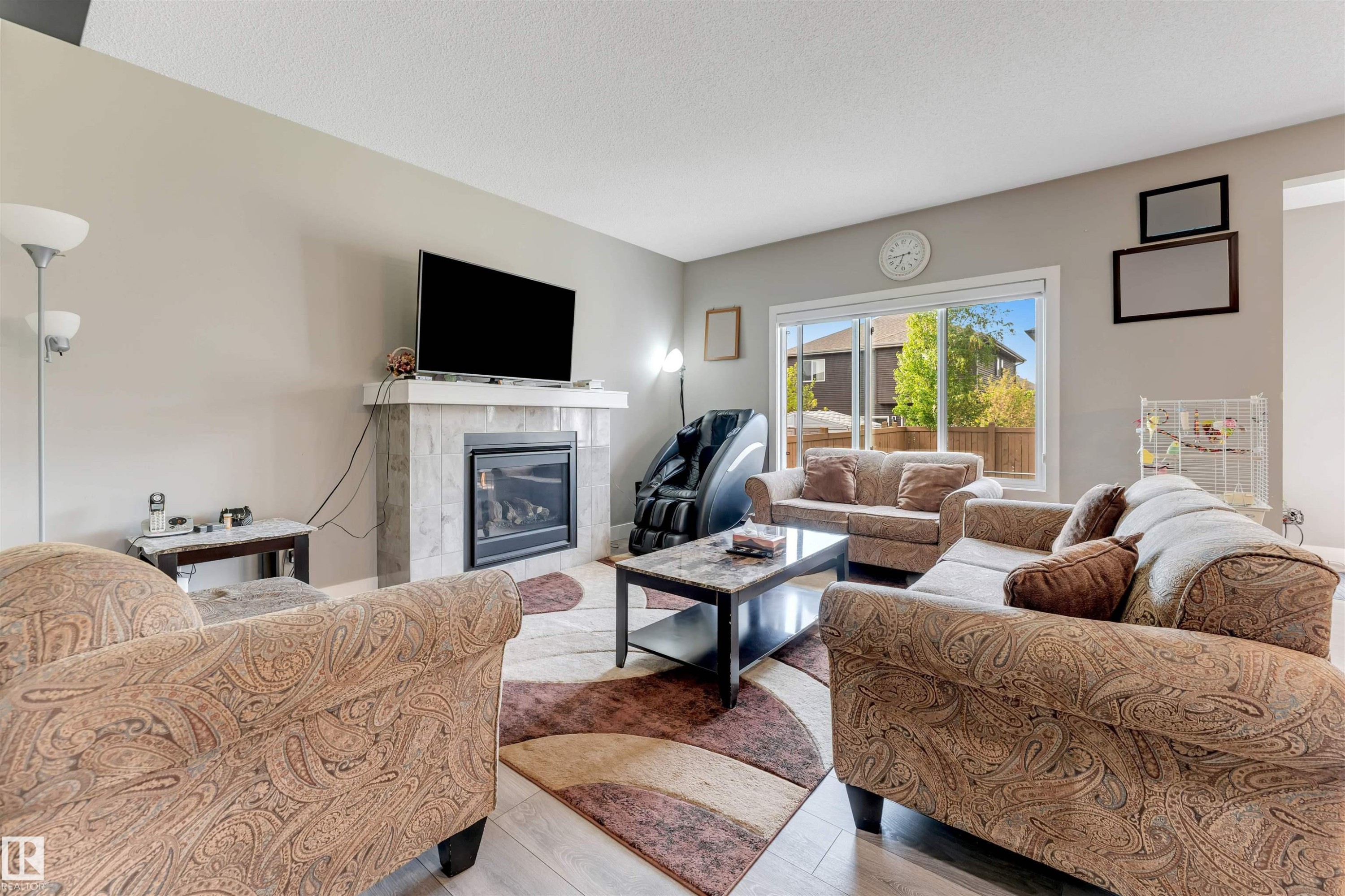 5930 19A Avenue, Edmonton, AB - Indoor Photo Showing Living Room With Fireplace