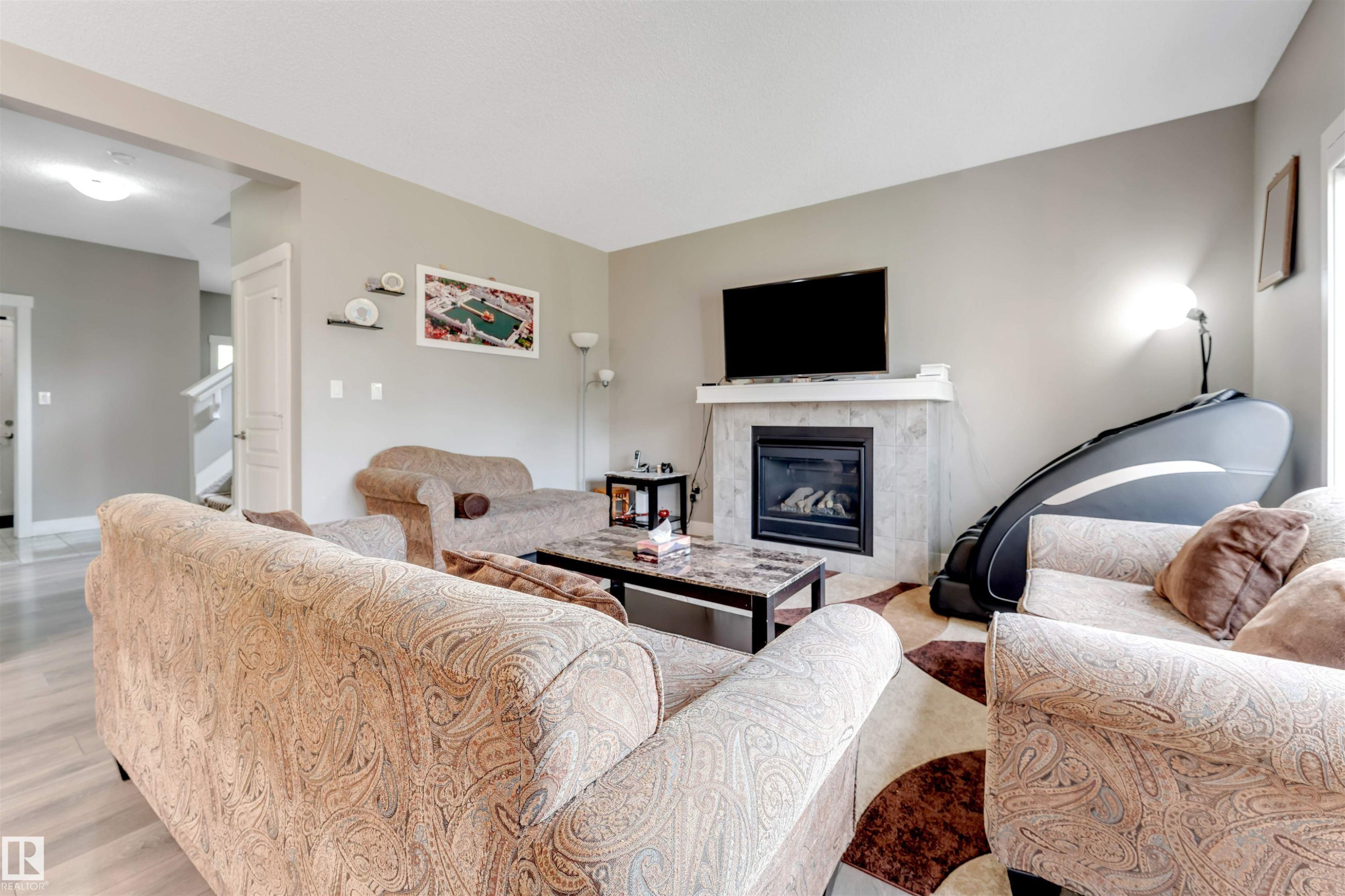 5930 19A Avenue, Edmonton, AB - Indoor Photo Showing Living Room With Fireplace