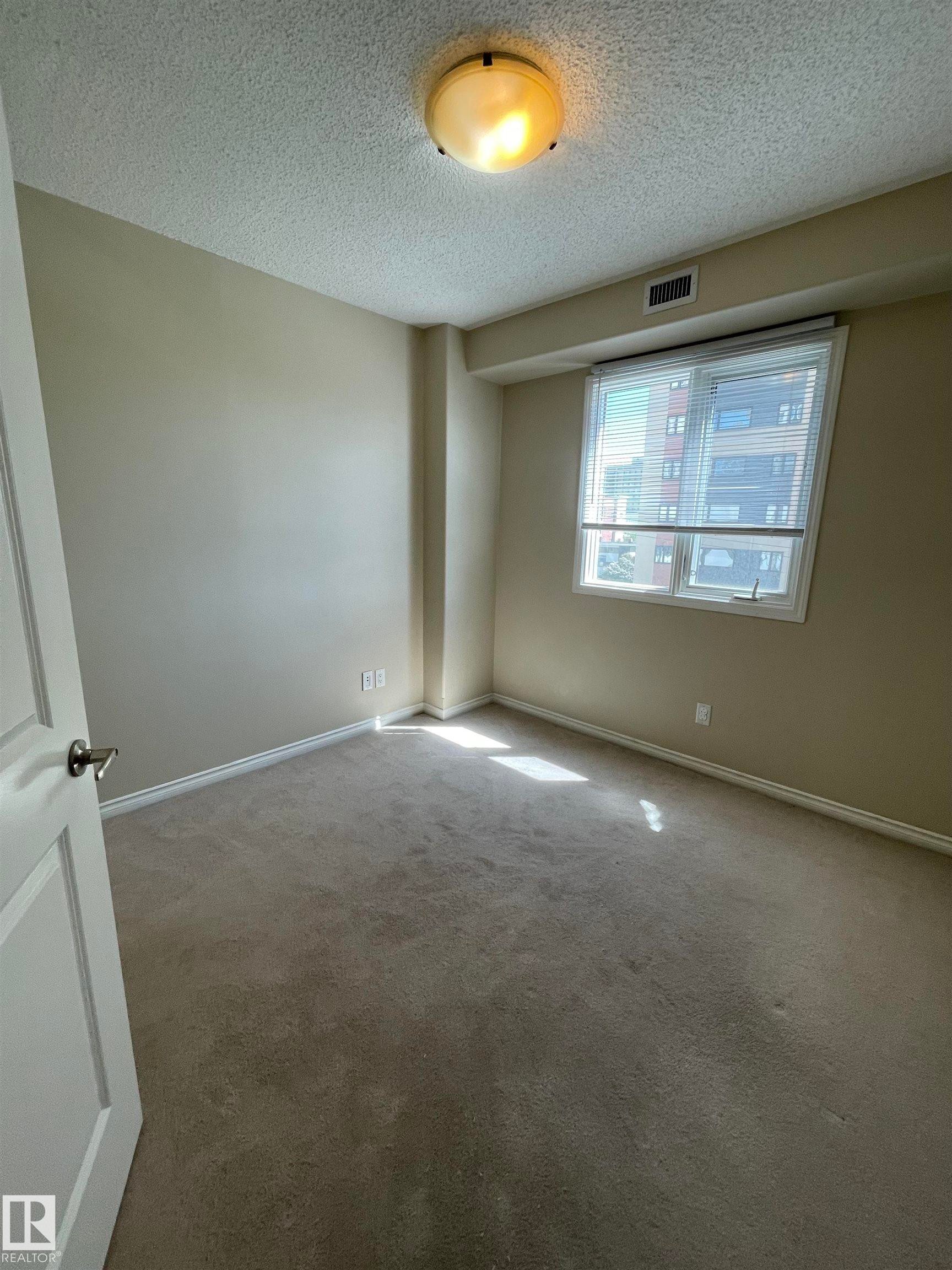 #205 9707 106 St Nw, Edmonton, AB - Indoor Photo Showing Other Room