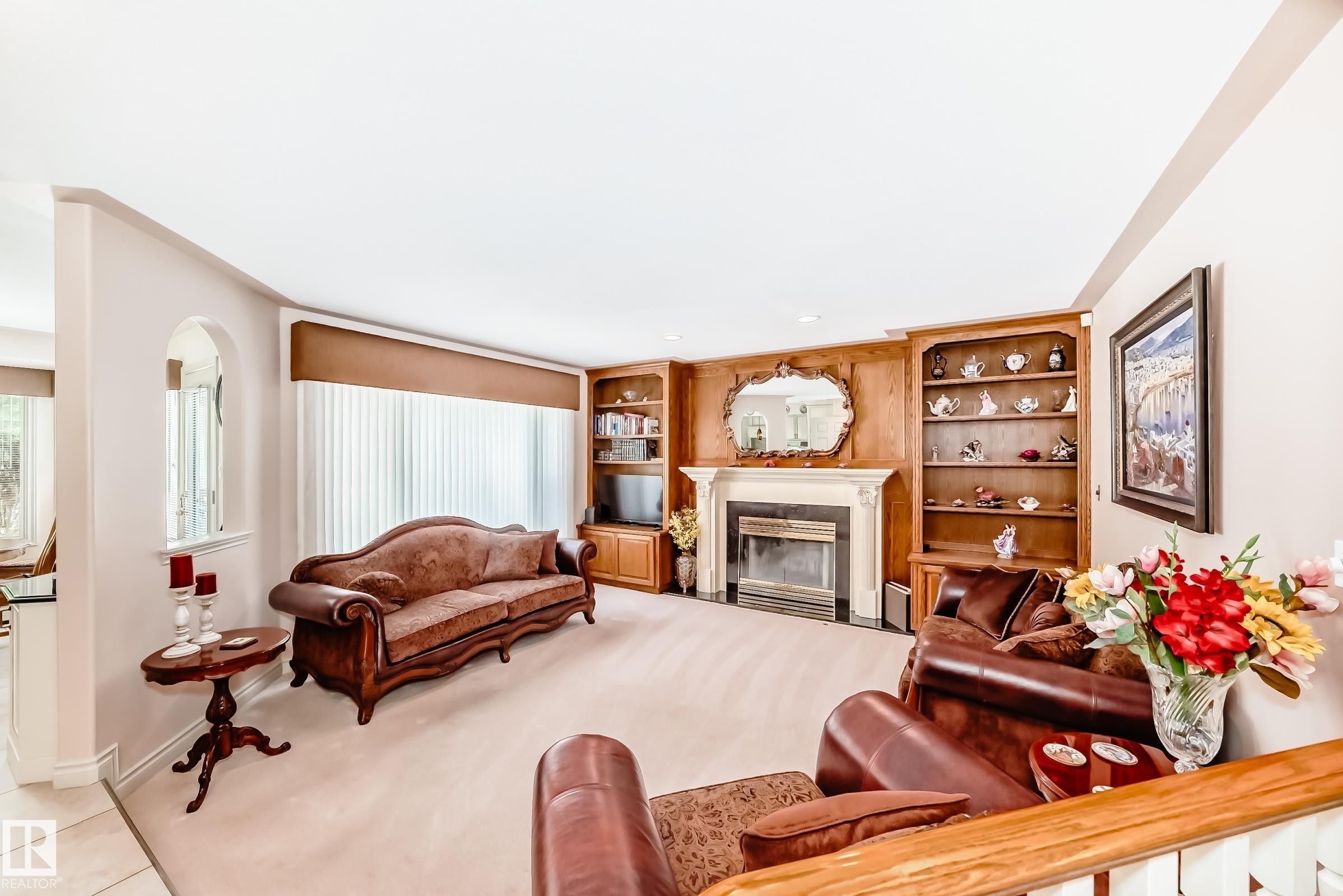 17416 53 Avenue Nw, Edmonton, AB - Indoor Photo Showing Living Room With Fireplace