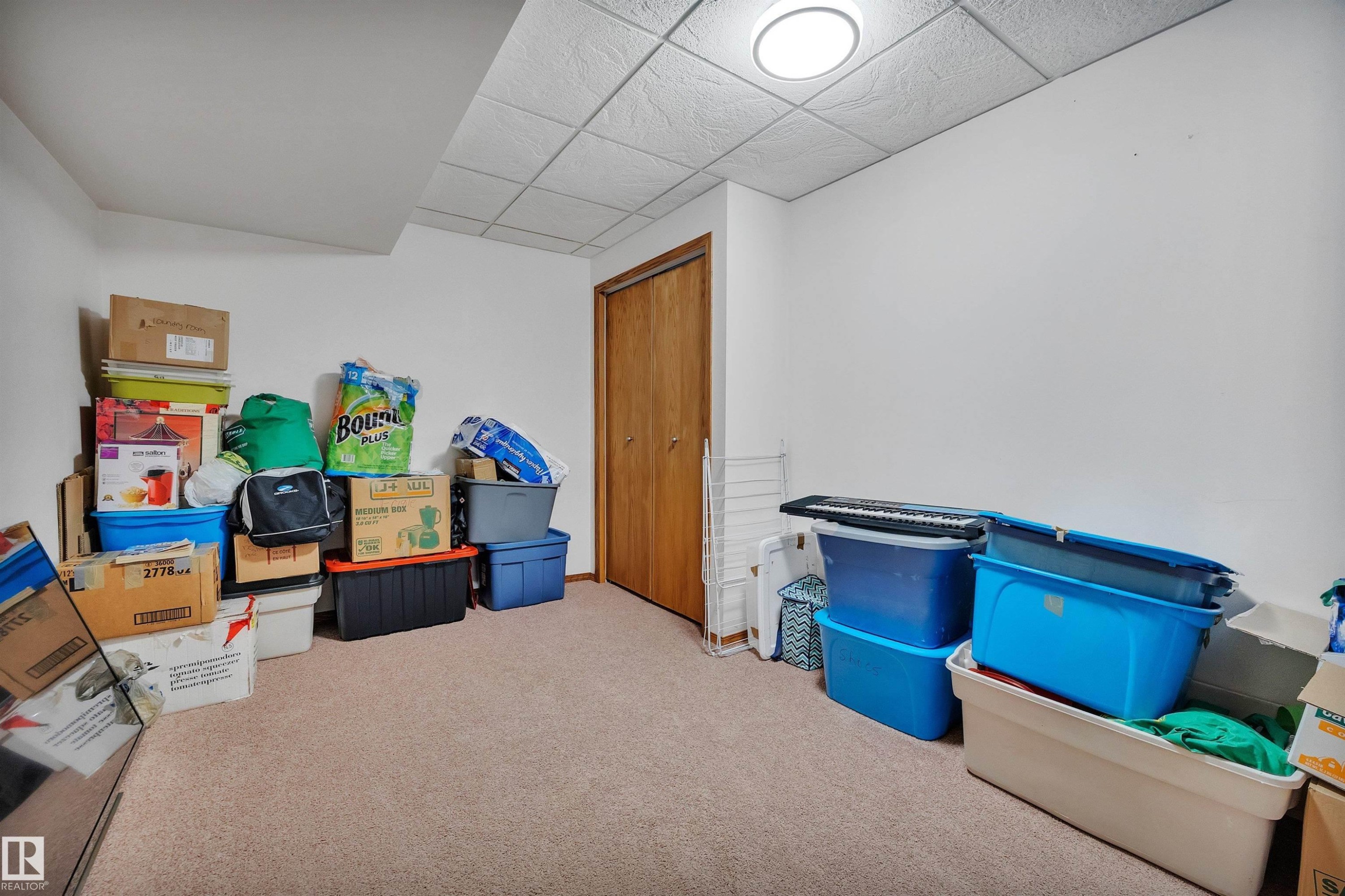 Carpeted room with a drop ceiling and recessed lighting - 16512 87 Street Nw, Edmonton, AB - Indoor Photo Showing Other Room