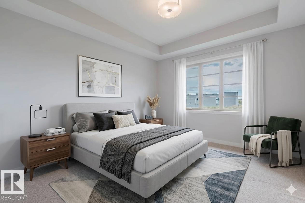 Spacious bedroom featuring light-colored walls and a tray ceiling - 2921 Anderson Crest Sw, Edmonton, AB - Indoor Photo Showing Bedroom