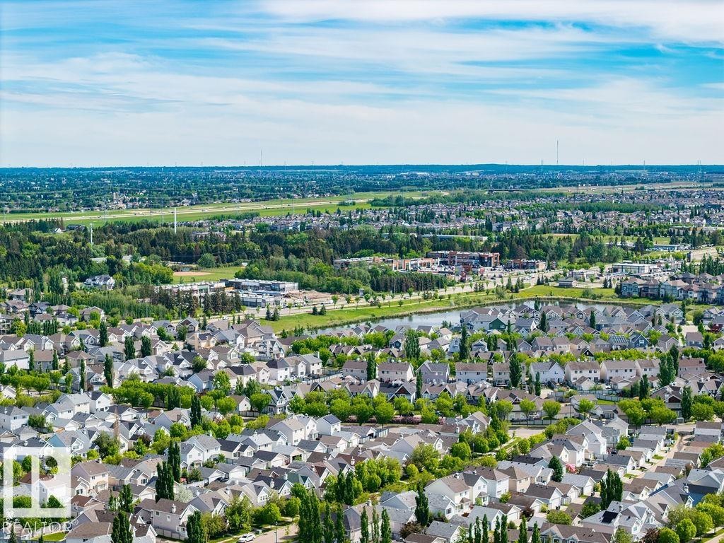 Residential neighborhood with a variety of single-family homes, mature trees, and green spaces - 71 3040 Spence Wynd, Edmonton, AB