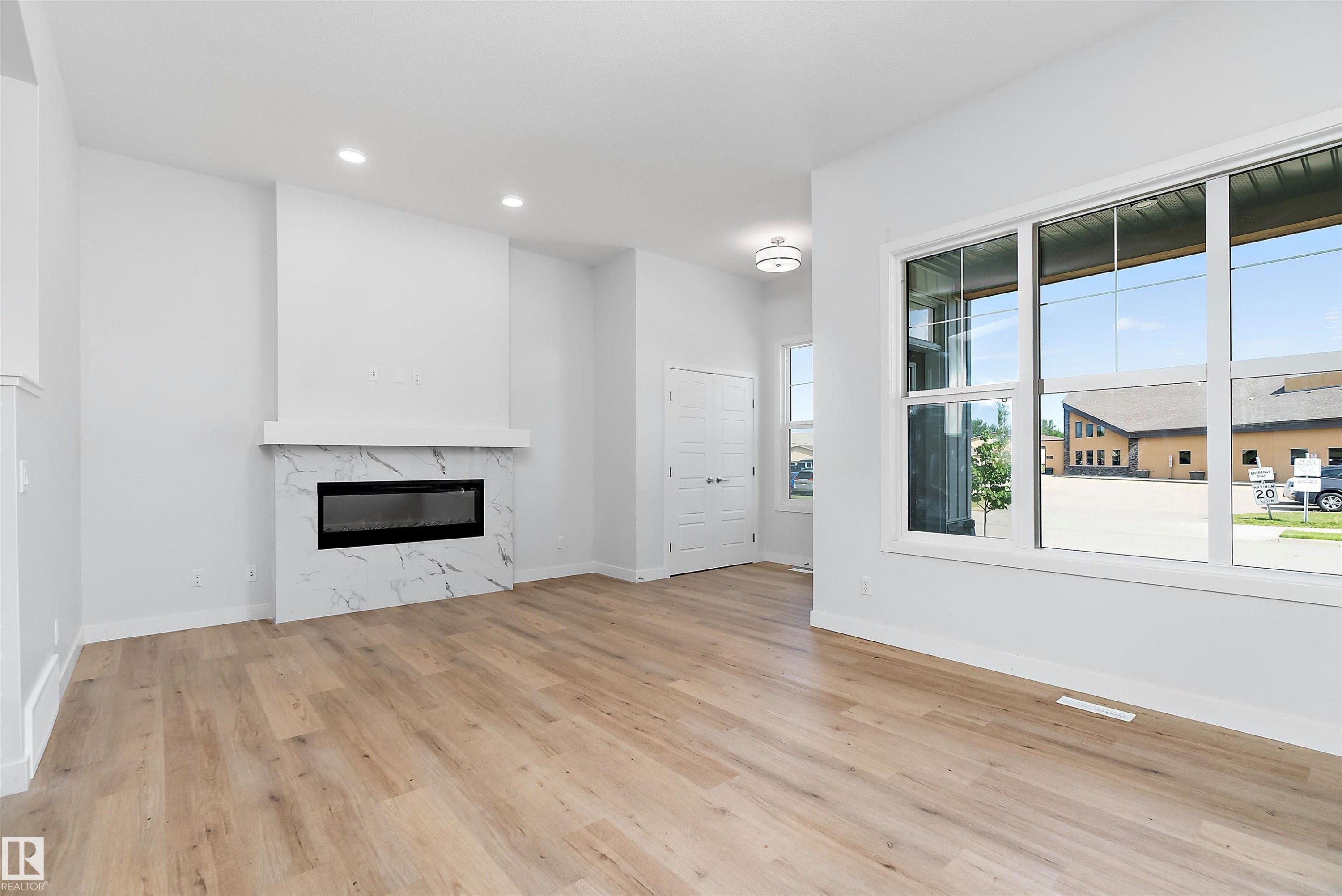 5275 Edgemont Boulevard Nw, Edmonton, AB - Indoor Photo Showing Living Room With Fireplace