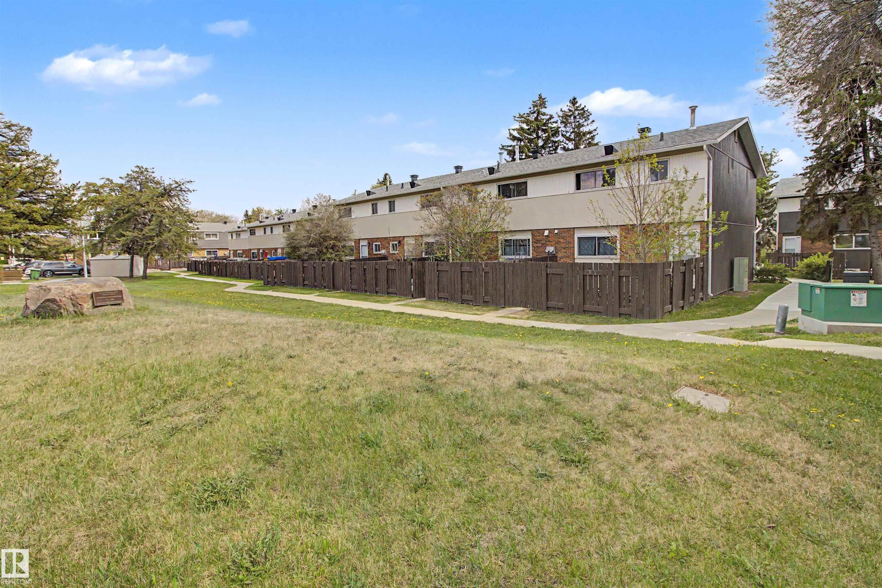 Expansive green space featuring a walking path and mature trees - 5724 143 Avenue, Edmonton, AB