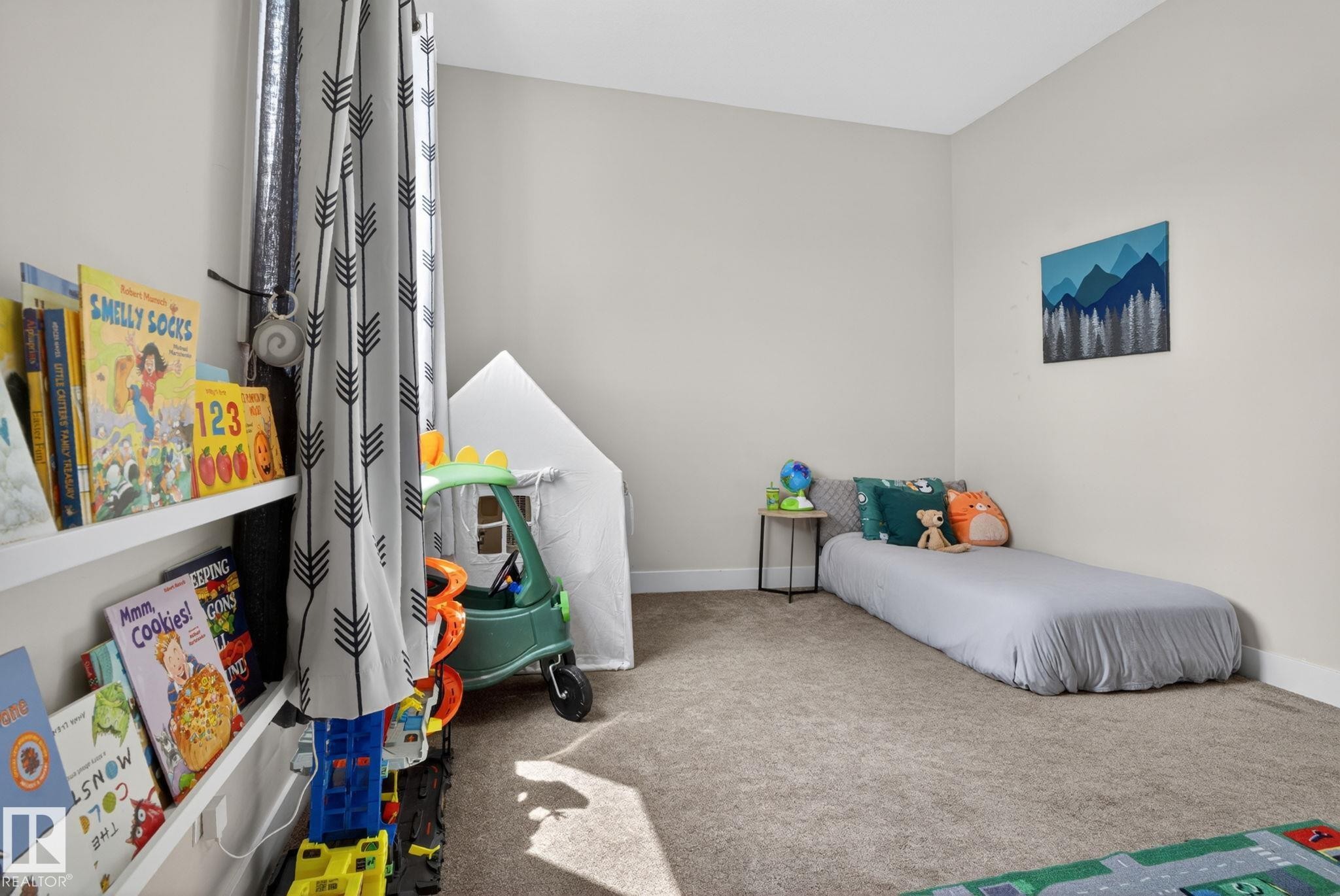 Neutral-toned room featuring light gray walls and plush carpeting - 4204 55Av, Lamont, AB