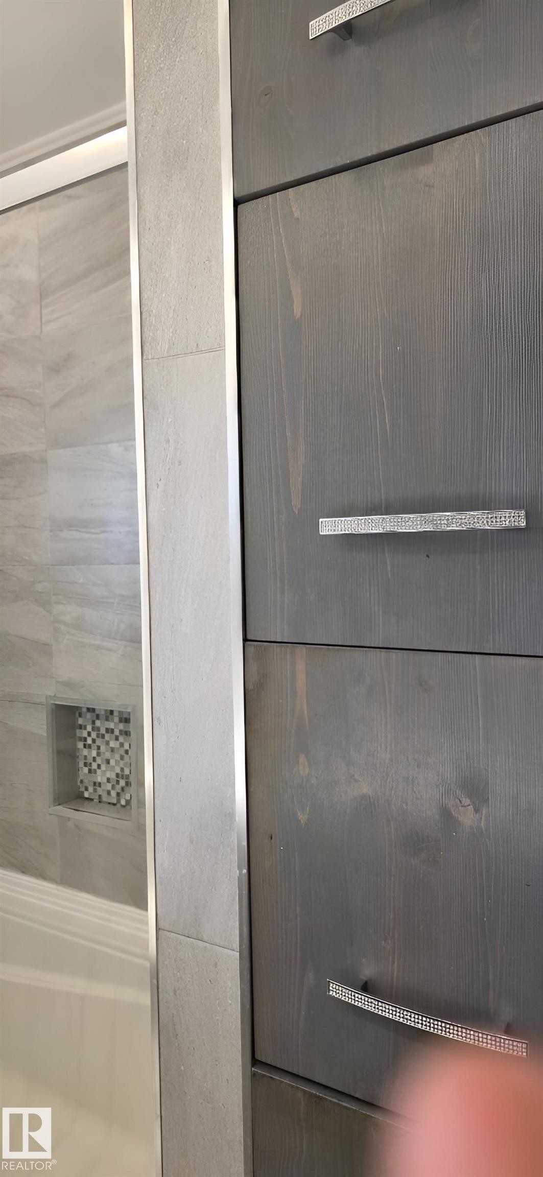 Grey wood-finish cabinetry with decorative pulls - 6704 93 Street, Edmonton, AB