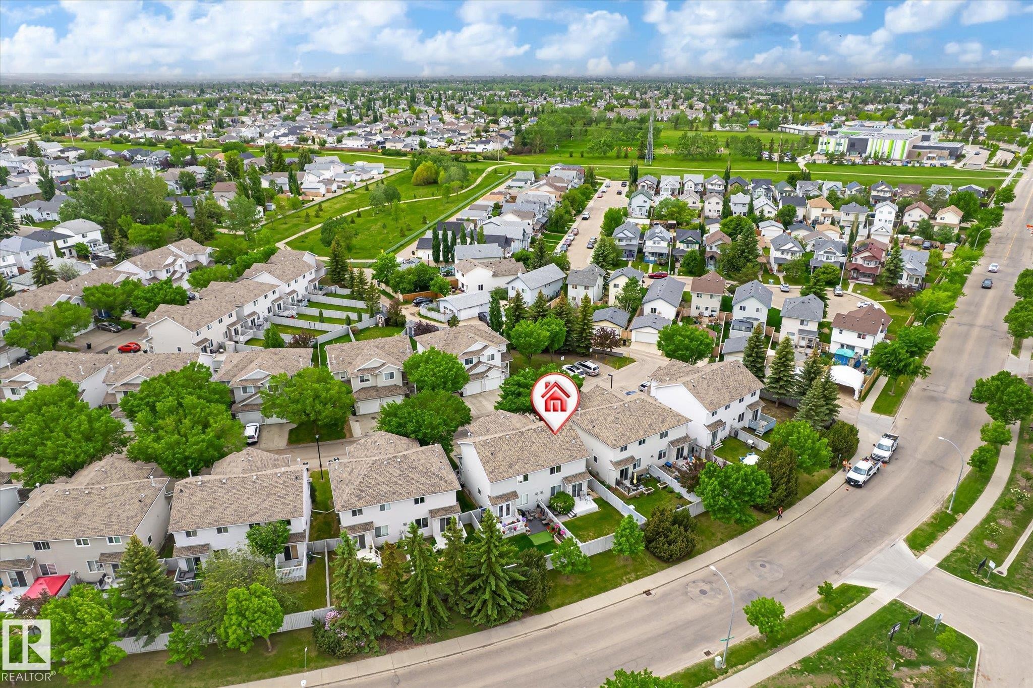 Aerial perspective highlighting a residential community with mature landscaping - #37 4020 21 St Nw, Edmonton, AB - Outdoor With View