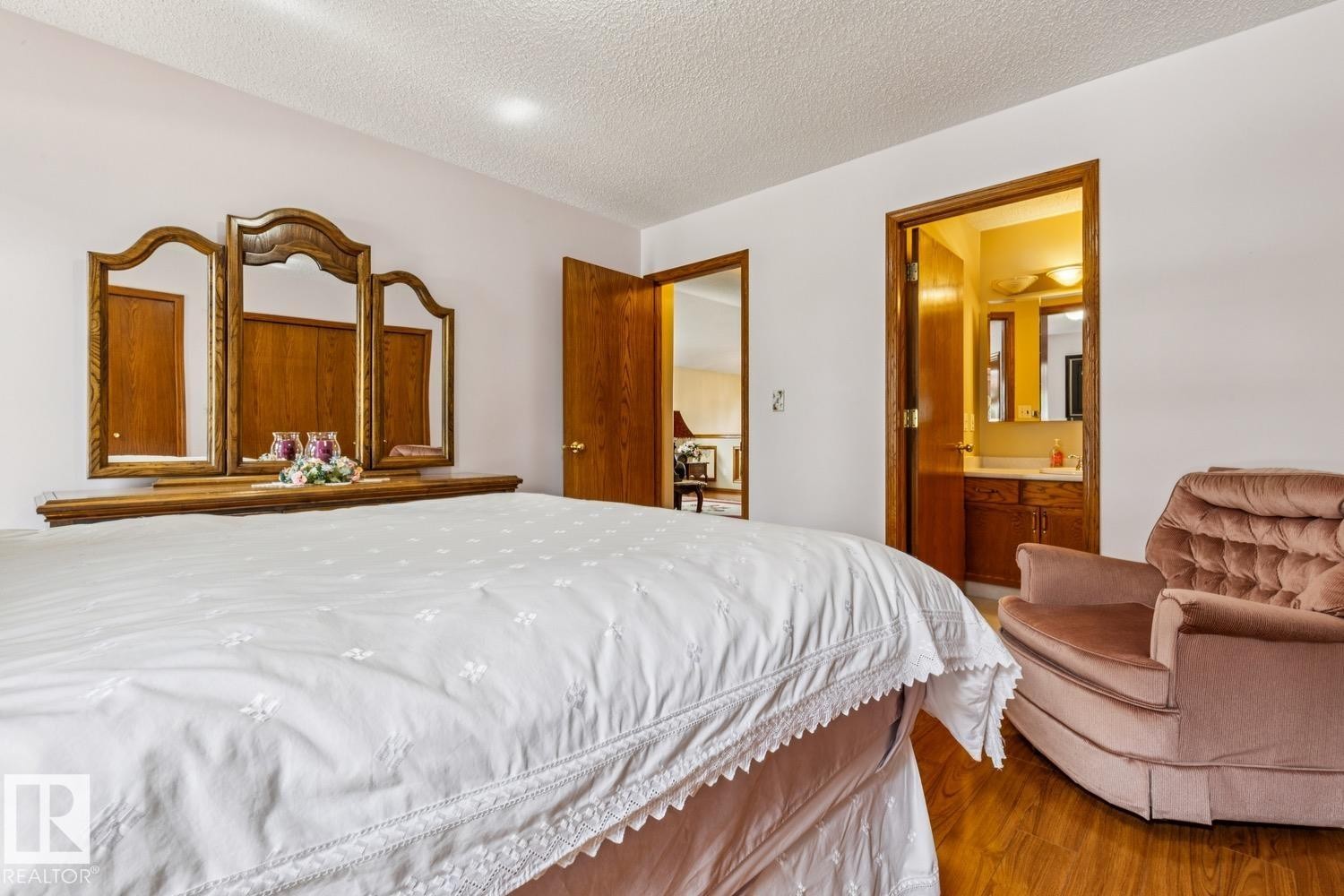 Bedroom features laminate flooring - 5131 152A Avenue, Edmonton, AB