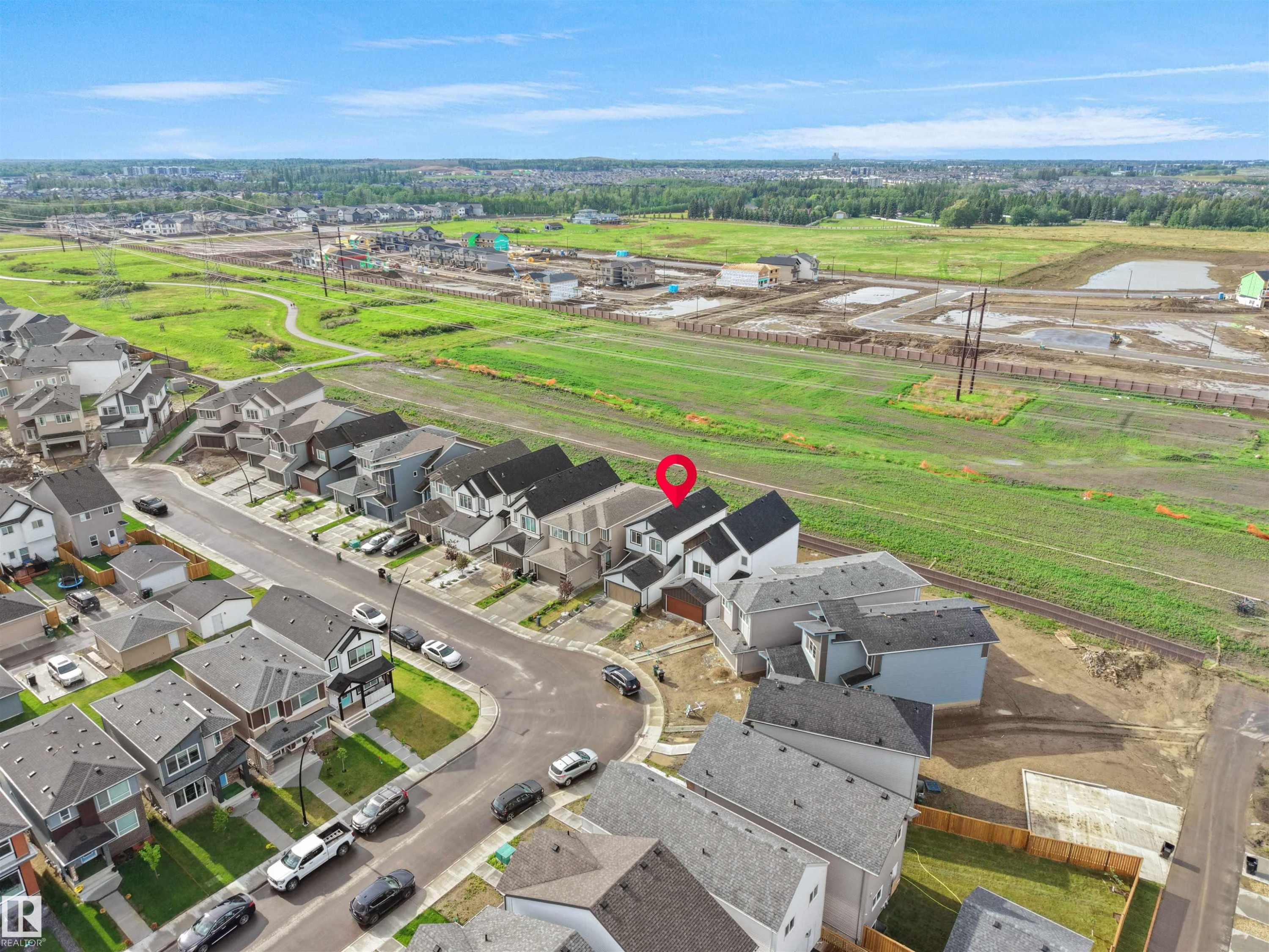 Aerial perspective showcasing a residential street with multiple detached homes - 19316 29 Avenue, Edmonton, AB
