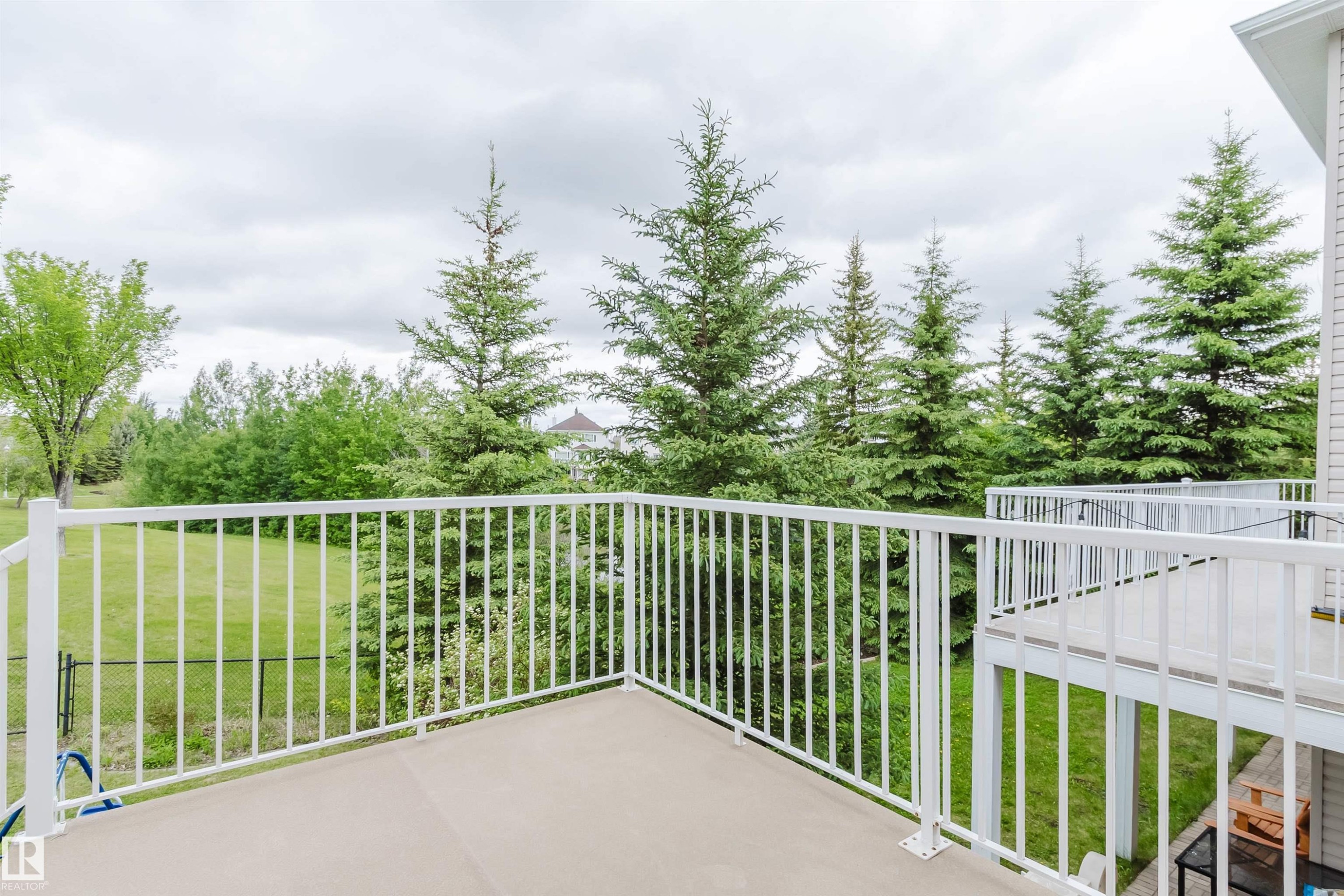 Exterior porch featuring light-colored siding and a neutral-toned floor surface - 2236 Garnett Crest, Edmonton, AB