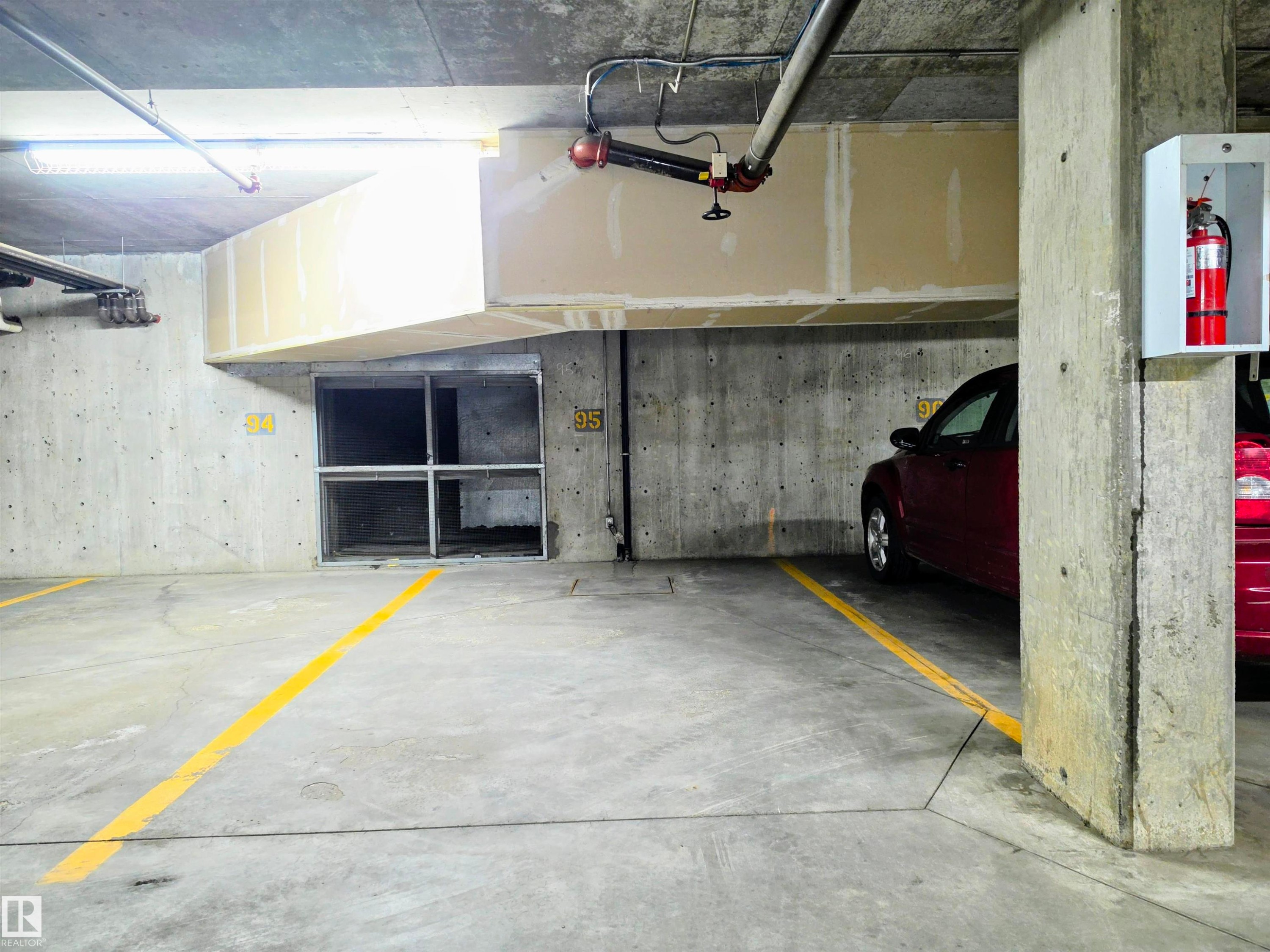 Dedicated parking space with concrete flooring - 115 4309 33 Street, Stony Plain, AB