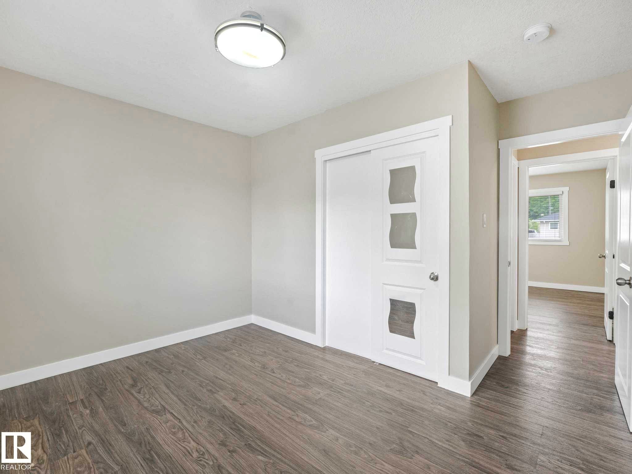 Empty room - 12241 54 Street Nw, Edmonton, AB - Indoor Photo Showing Other Room