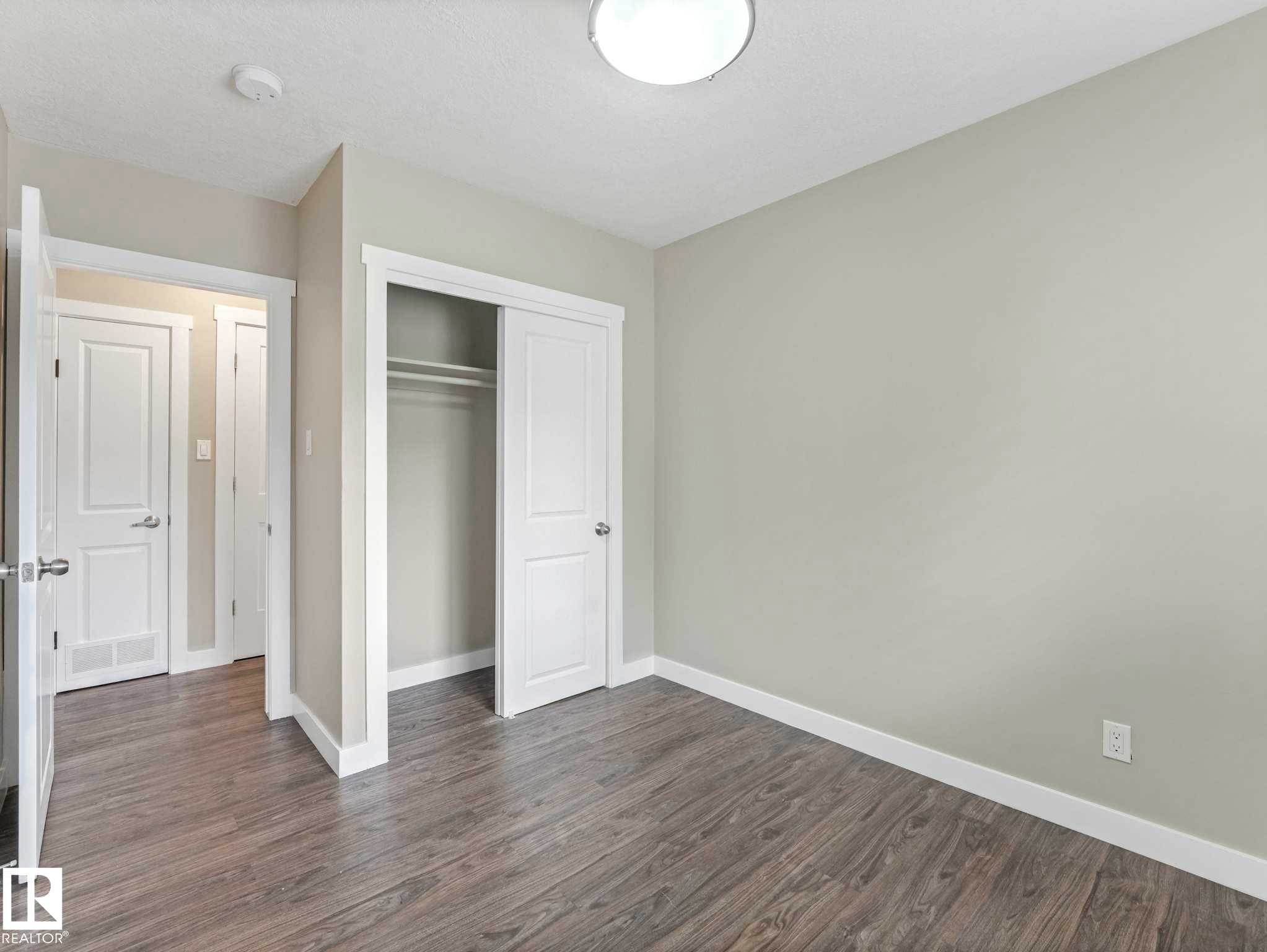 Bedroom - 12241 54 Street Nw, Edmonton, AB - Indoor Photo Showing Other Room