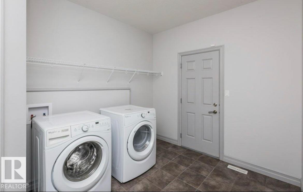 5912 19 Avenue Sw, Edmonton, AB - Indoor Photo Showing Laundry Room