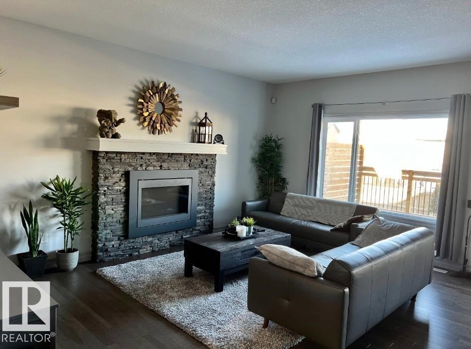 5912 19 Avenue Sw, Edmonton, AB - Indoor Photo Showing Living Room With Fireplace