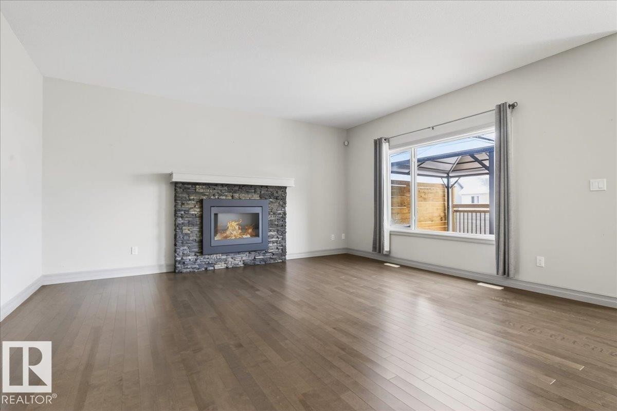 5912 19 Avenue Sw, Edmonton, AB - Indoor Photo Showing Living Room With Fireplace