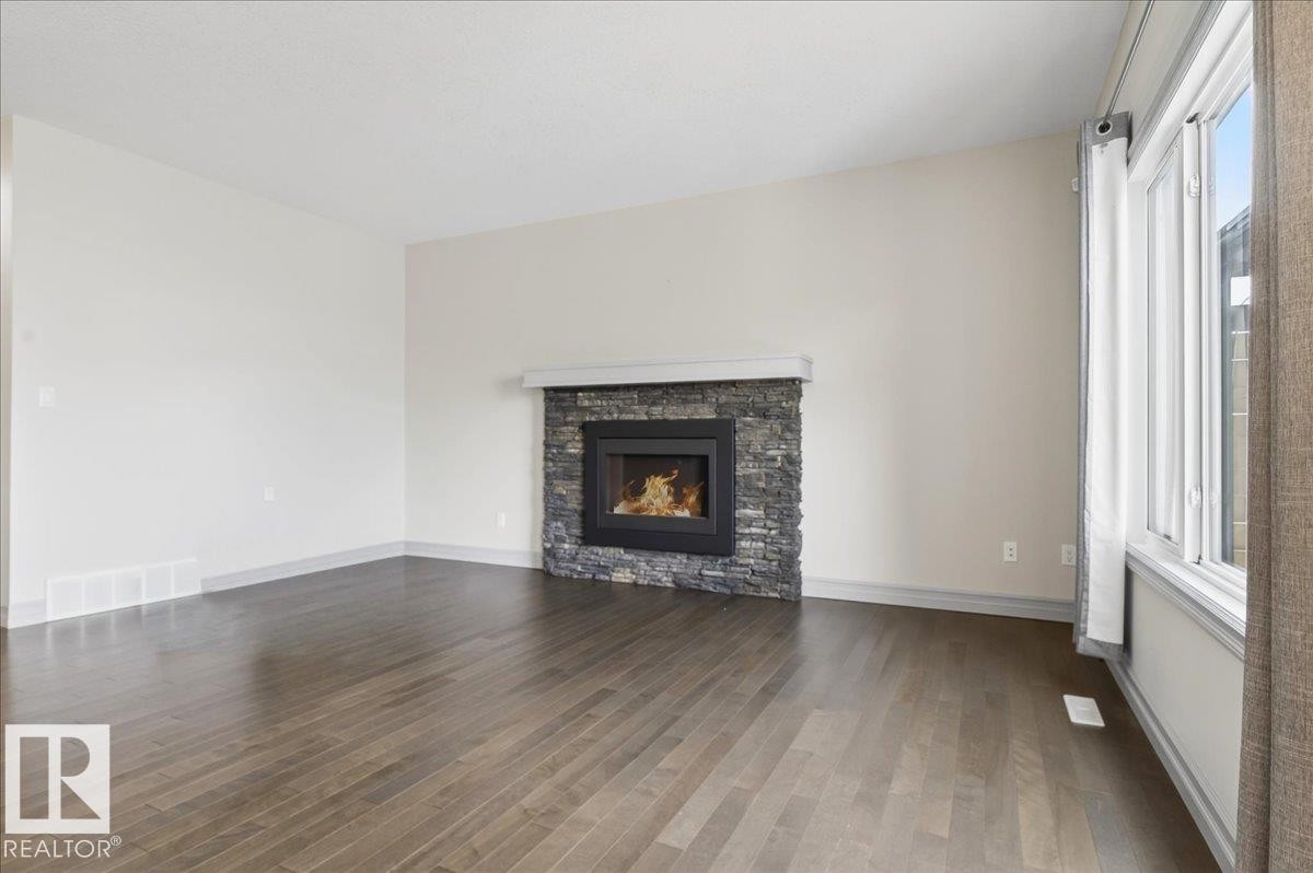 5912 19 Avenue Sw, Edmonton, AB - Indoor Photo Showing Living Room With Fireplace