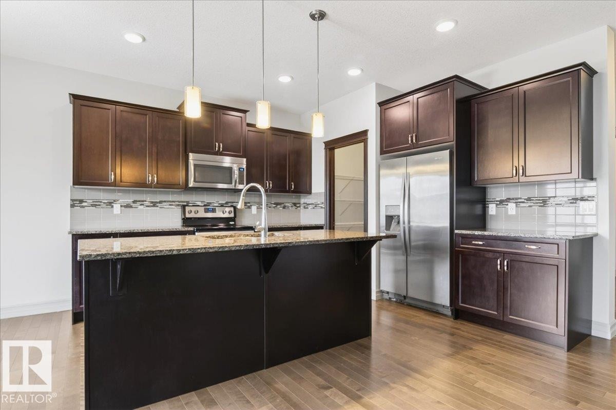 5912 19 Avenue Sw, Edmonton, AB - Indoor Photo Showing Kitchen With Stainless Steel Kitchen With Upgraded Kitchen
