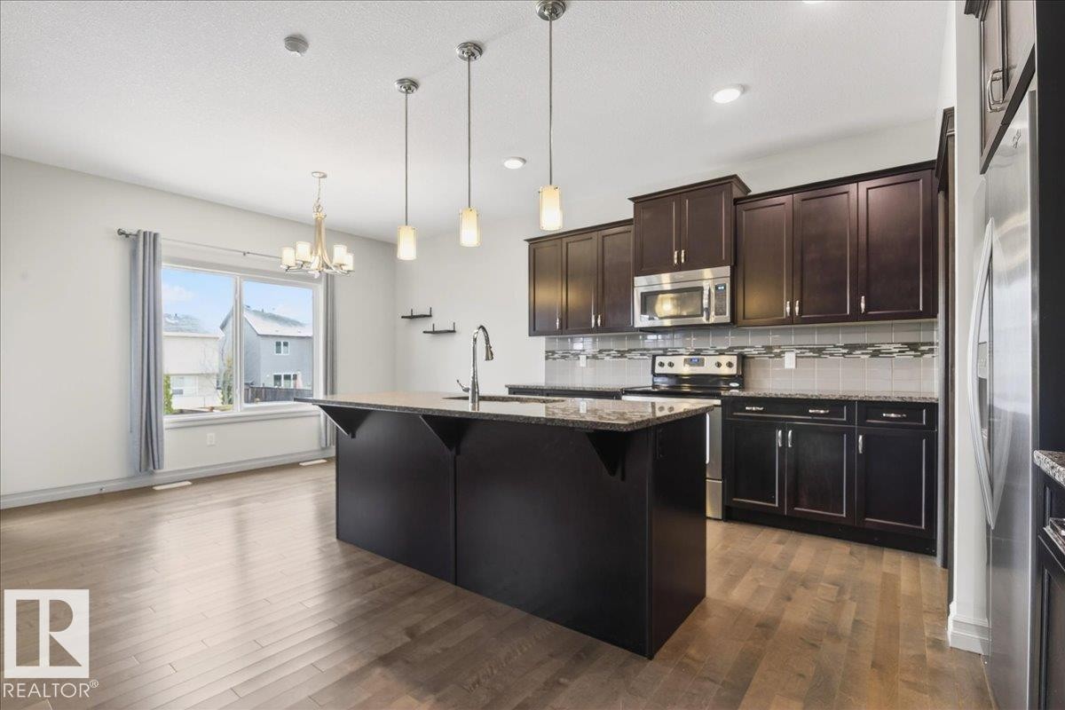 5912 19 Avenue Sw, Edmonton, AB - Indoor Photo Showing Kitchen With Stainless Steel Kitchen With Upgraded Kitchen