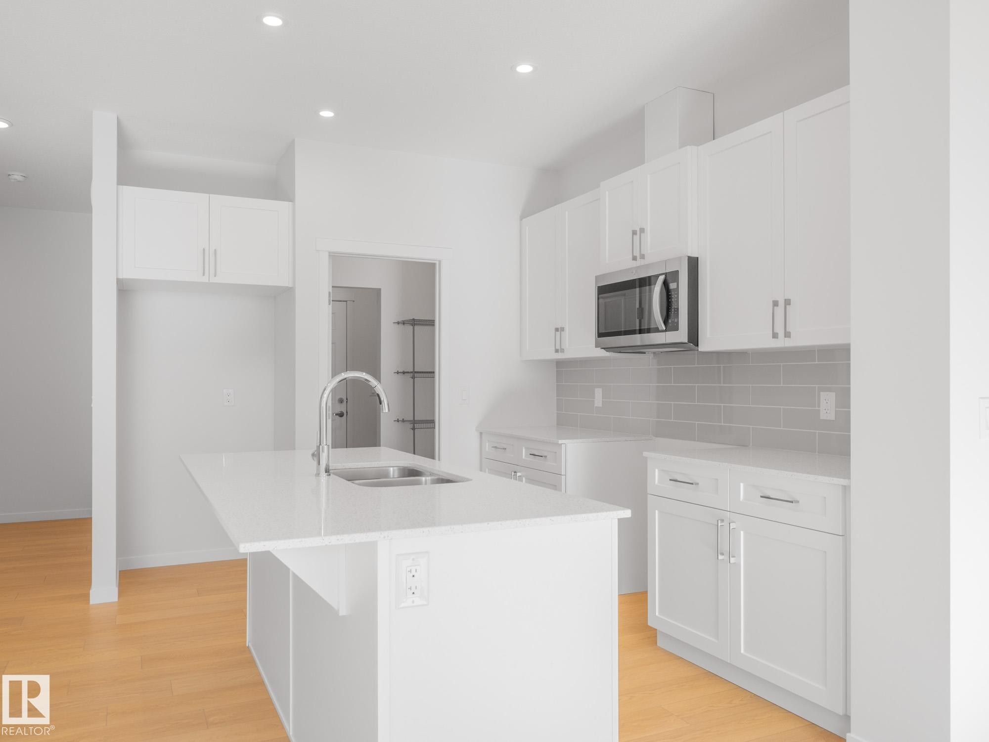 7408 Keeler Crescent Sw, Edmonton, AB - Indoor Photo Showing Kitchen With Double Sink With Upgraded Kitchen