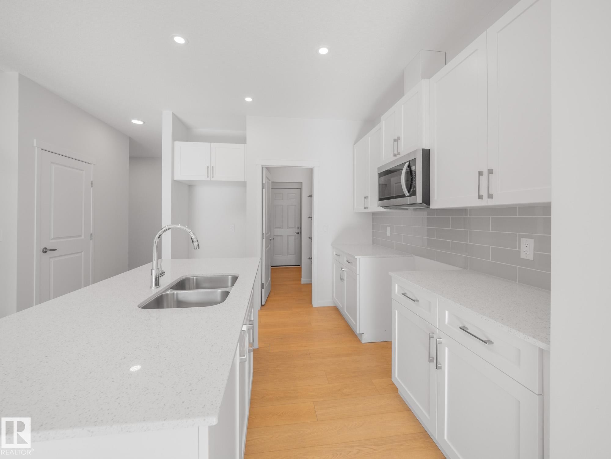 7408 Keeler Crescent Sw, Edmonton, AB - Indoor Photo Showing Kitchen With Double Sink With Upgraded Kitchen