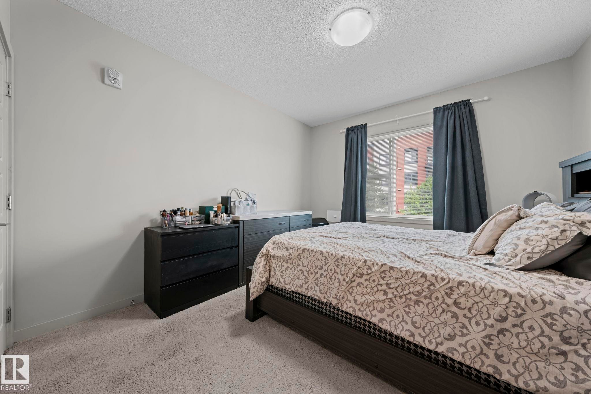 #207 320 Ambleside Li Sw, Edmonton, AB - Indoor Photo Showing Bedroom