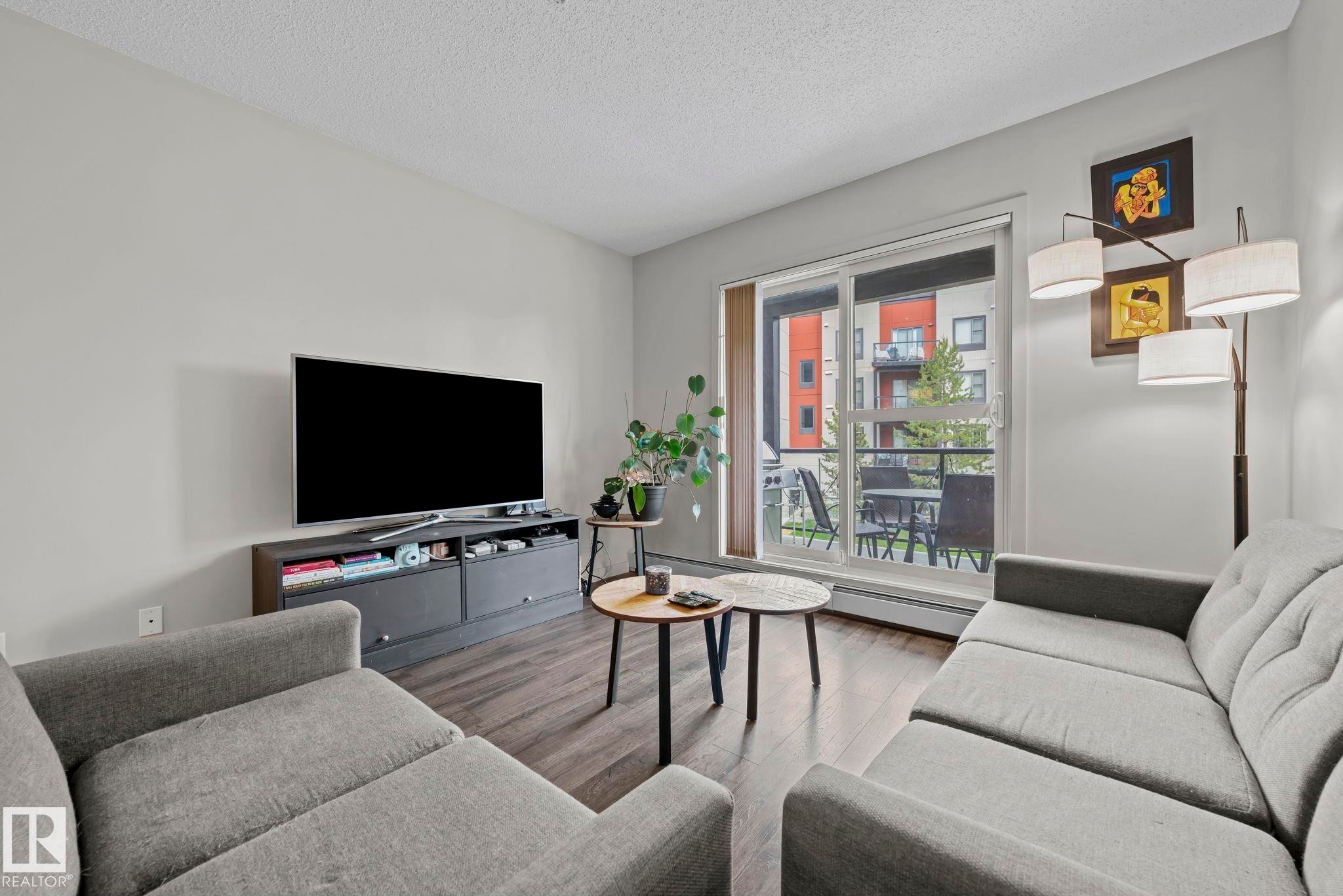 #207 320 Ambleside Li Sw, Edmonton, AB - Indoor Photo Showing Living Room